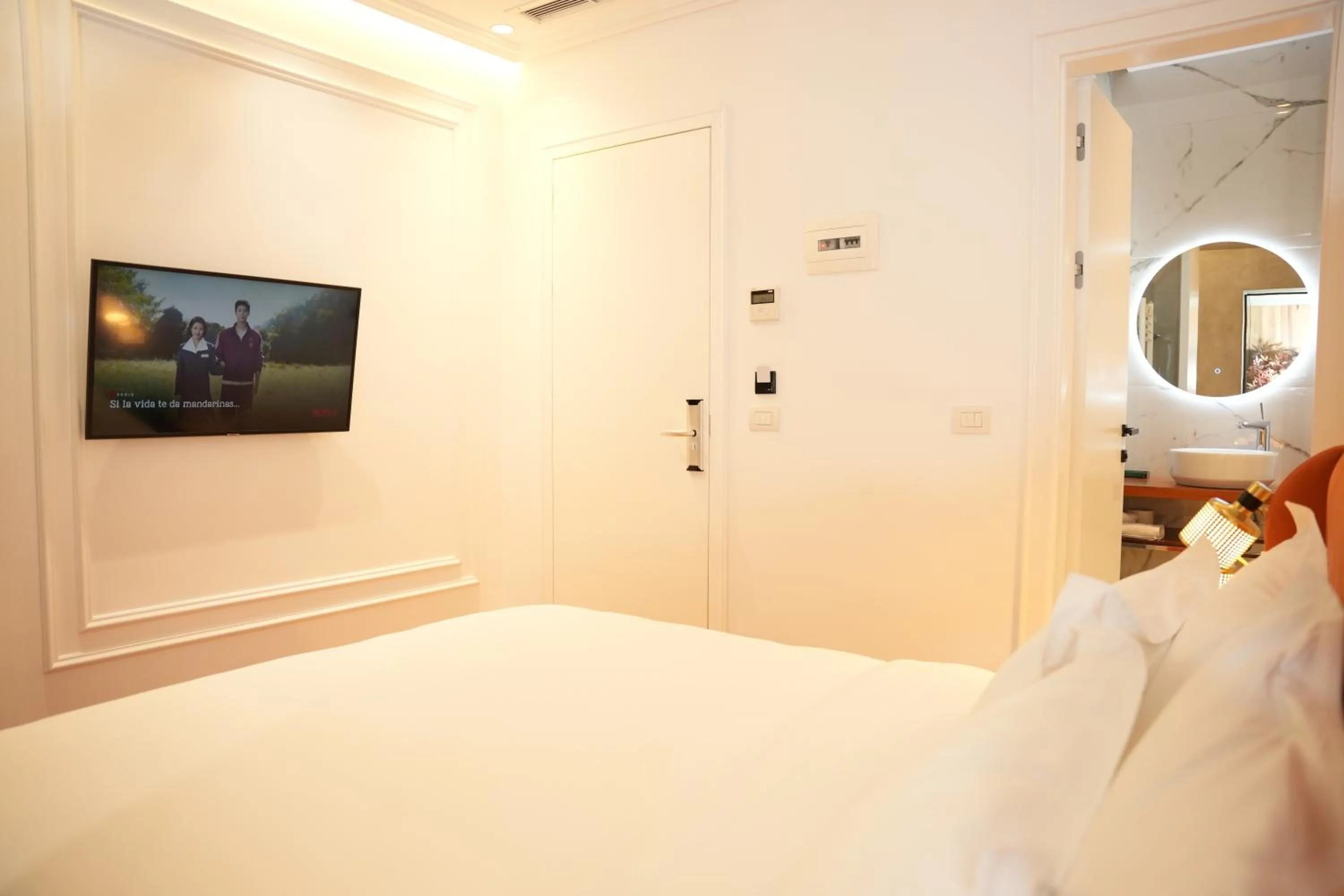 Bed in La Suite Boutique Hotel