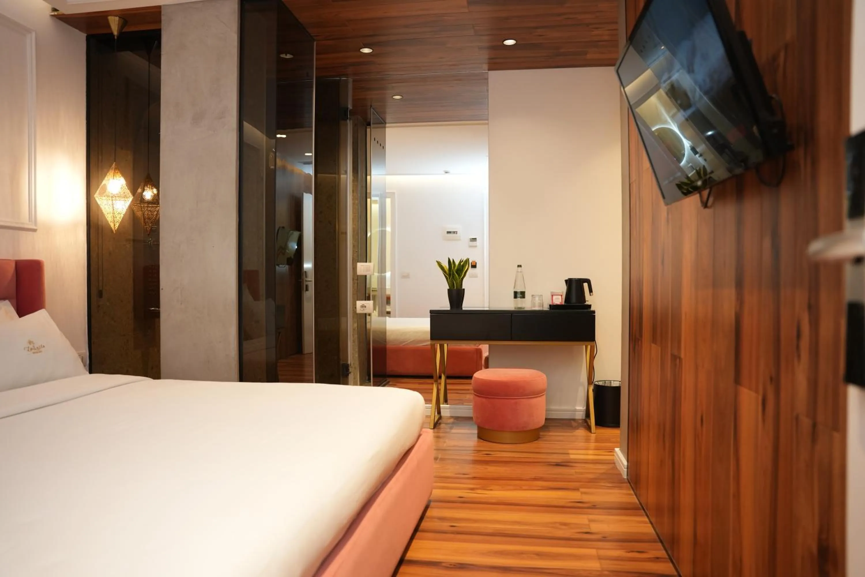 Bed in La Suite Boutique Hotel