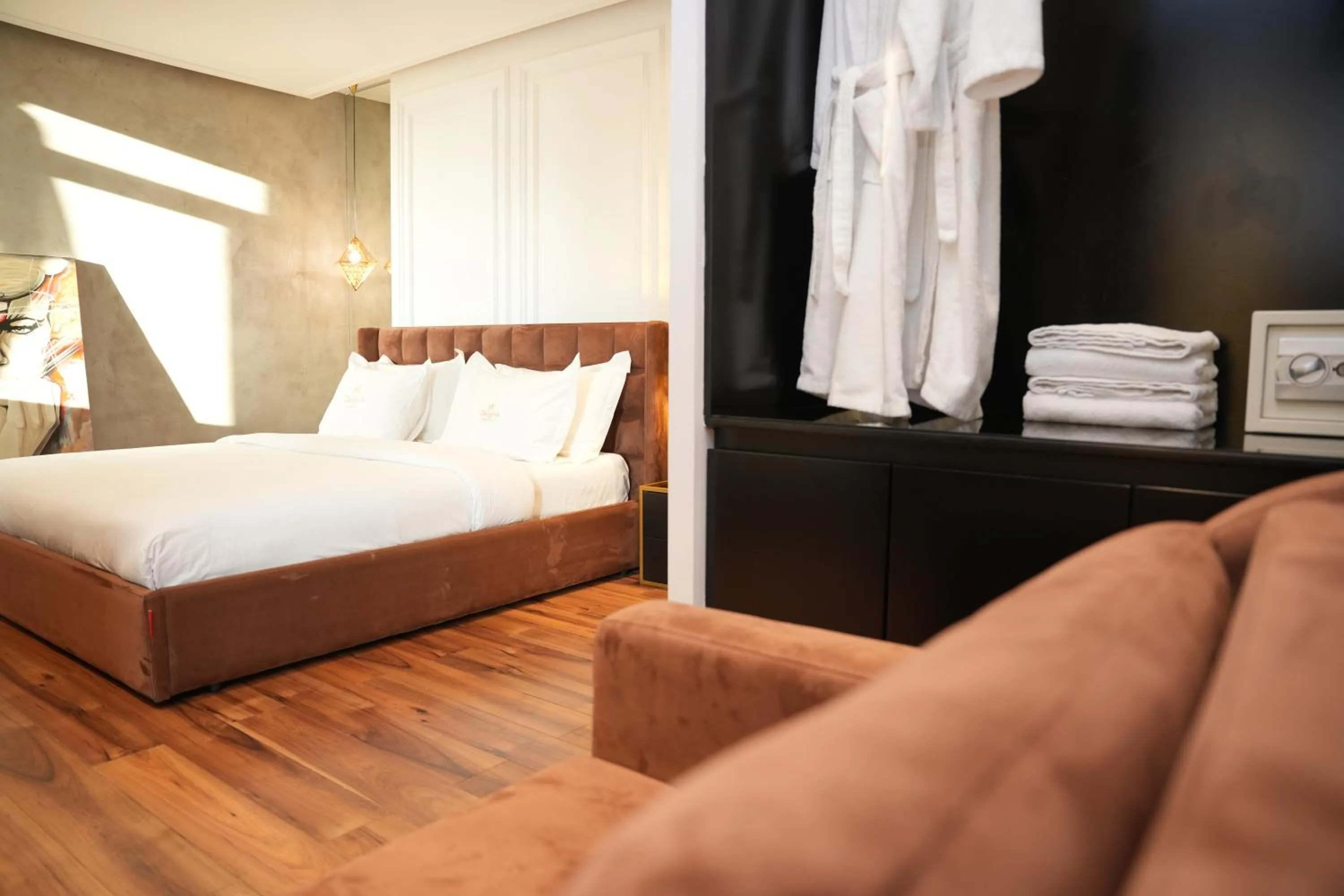 Bed in La Suite Boutique Hotel