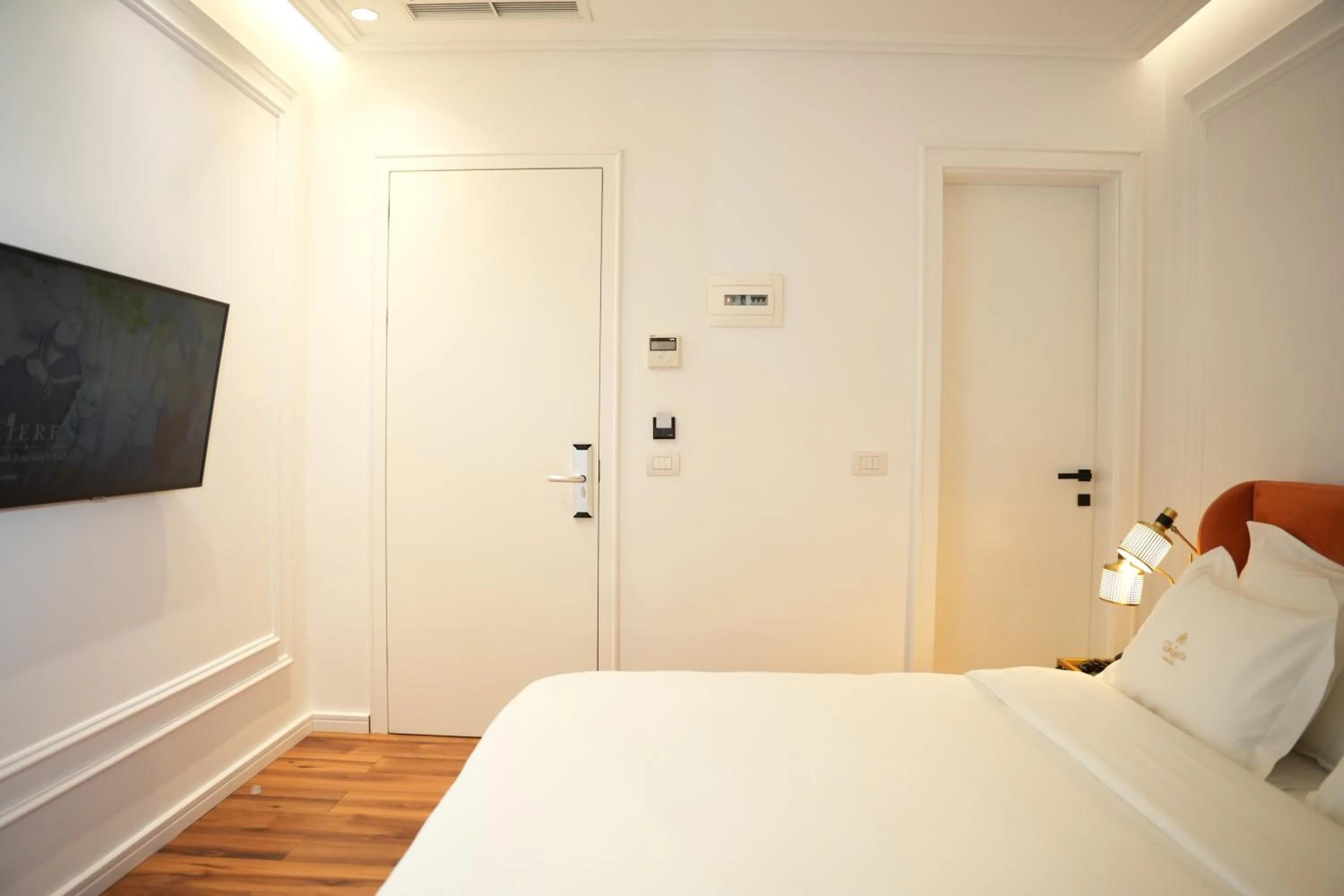 Bed in La Suite Boutique Hotel