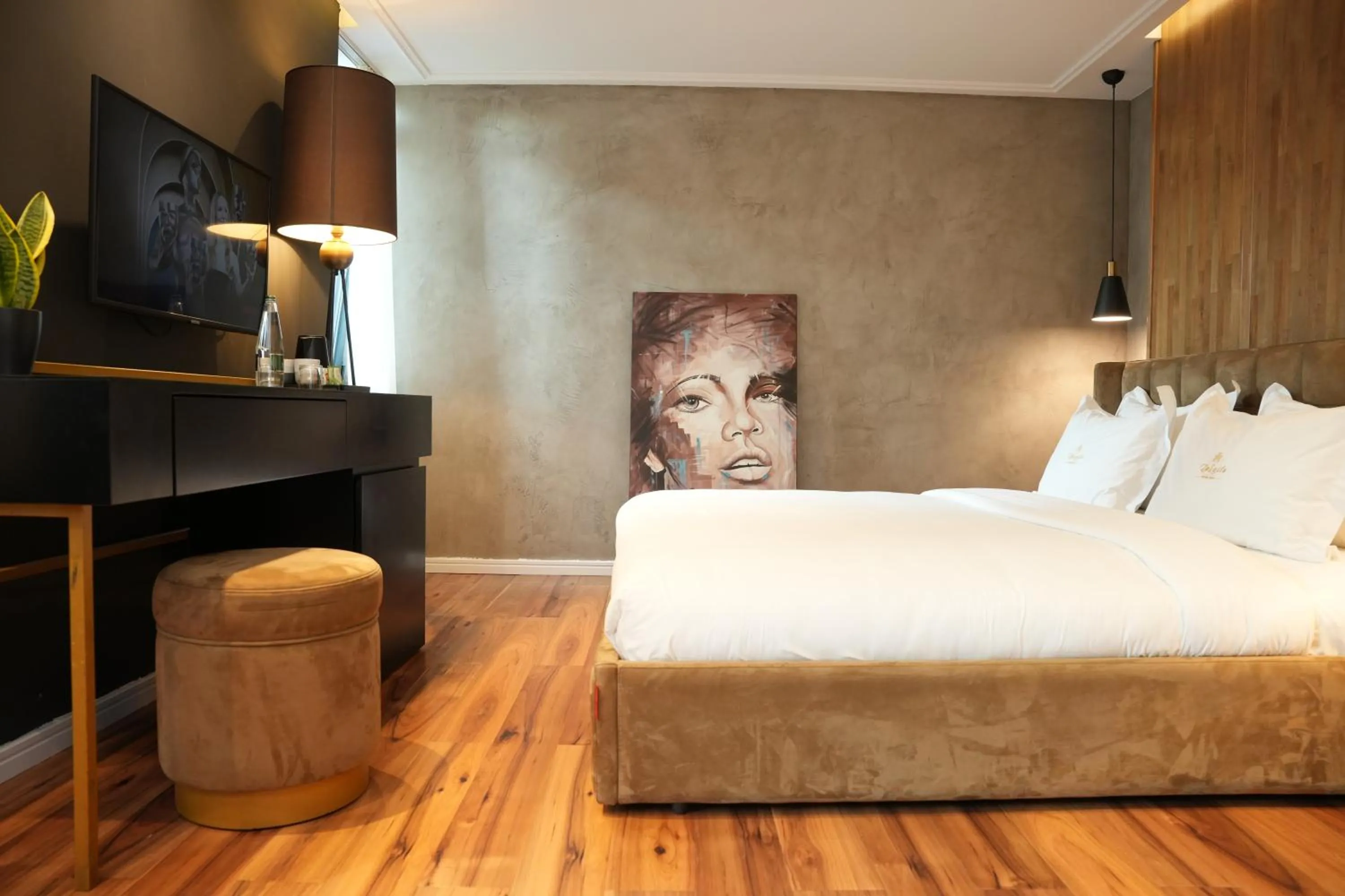 Bed in La Suite Boutique Hotel