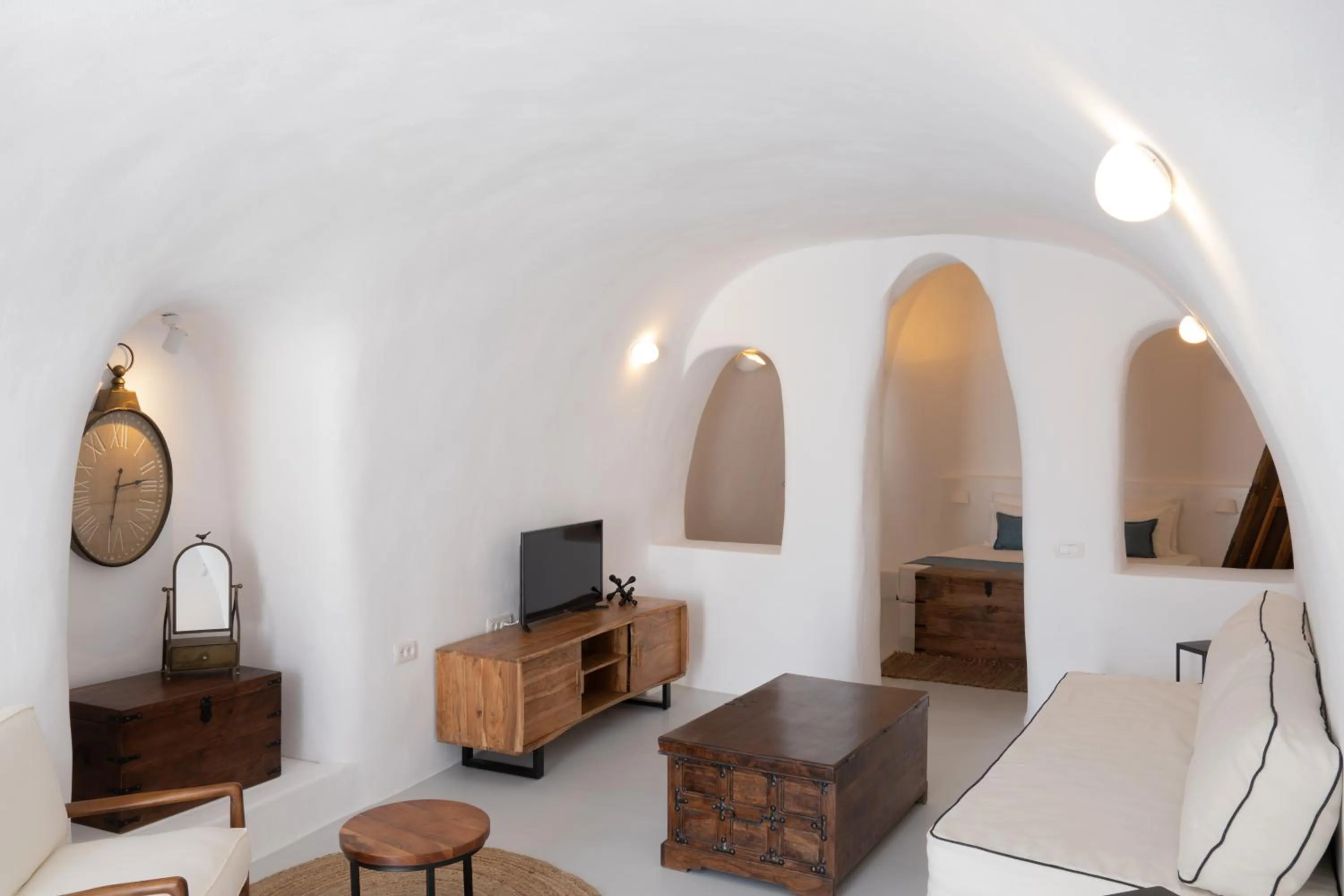 Living room, Bed in Oia Spirit Boutique Residences