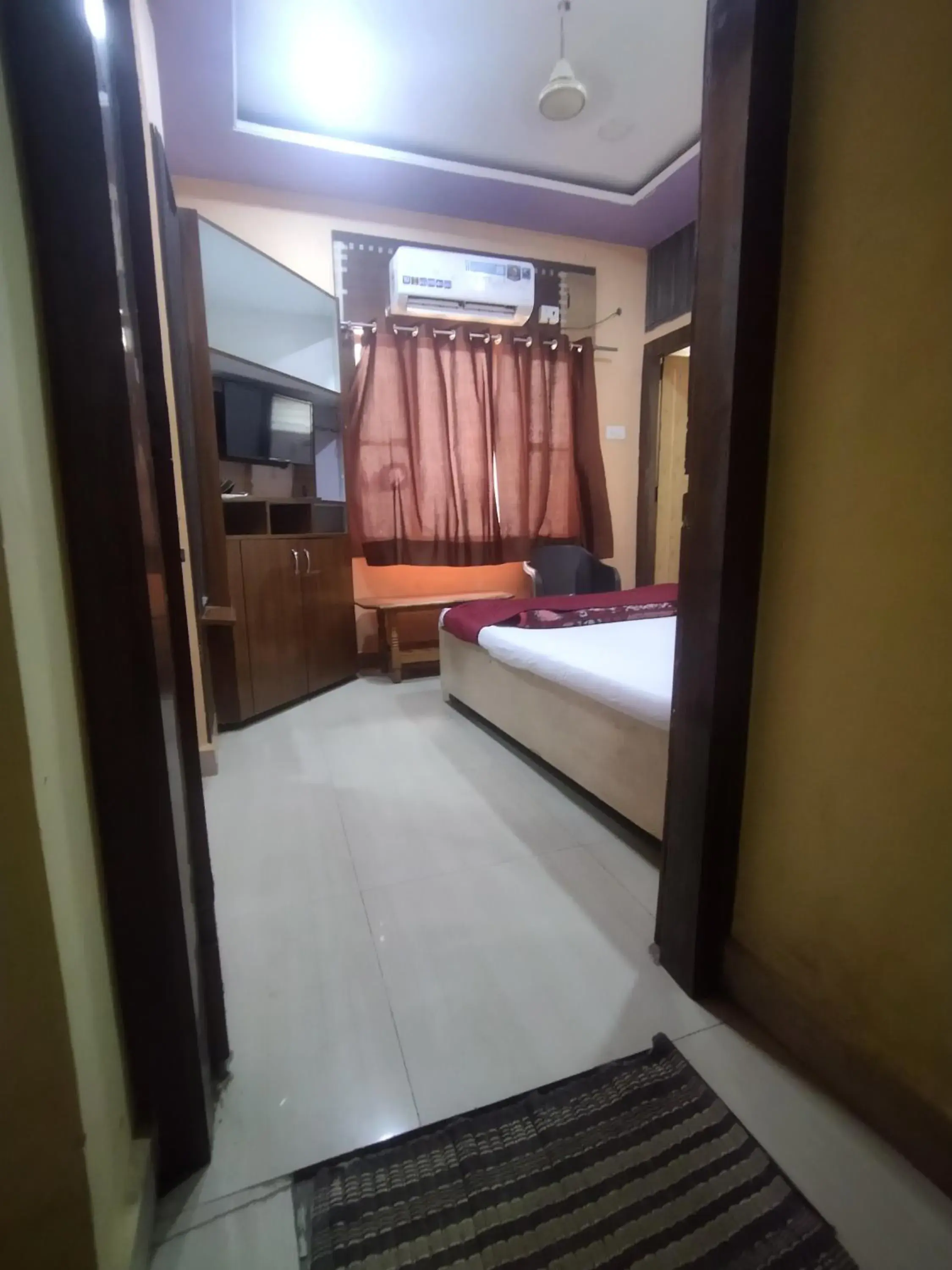 Photo of the whole room in Hotel Thakur Ji Photo of the whole room in Hotel Thakur Ji