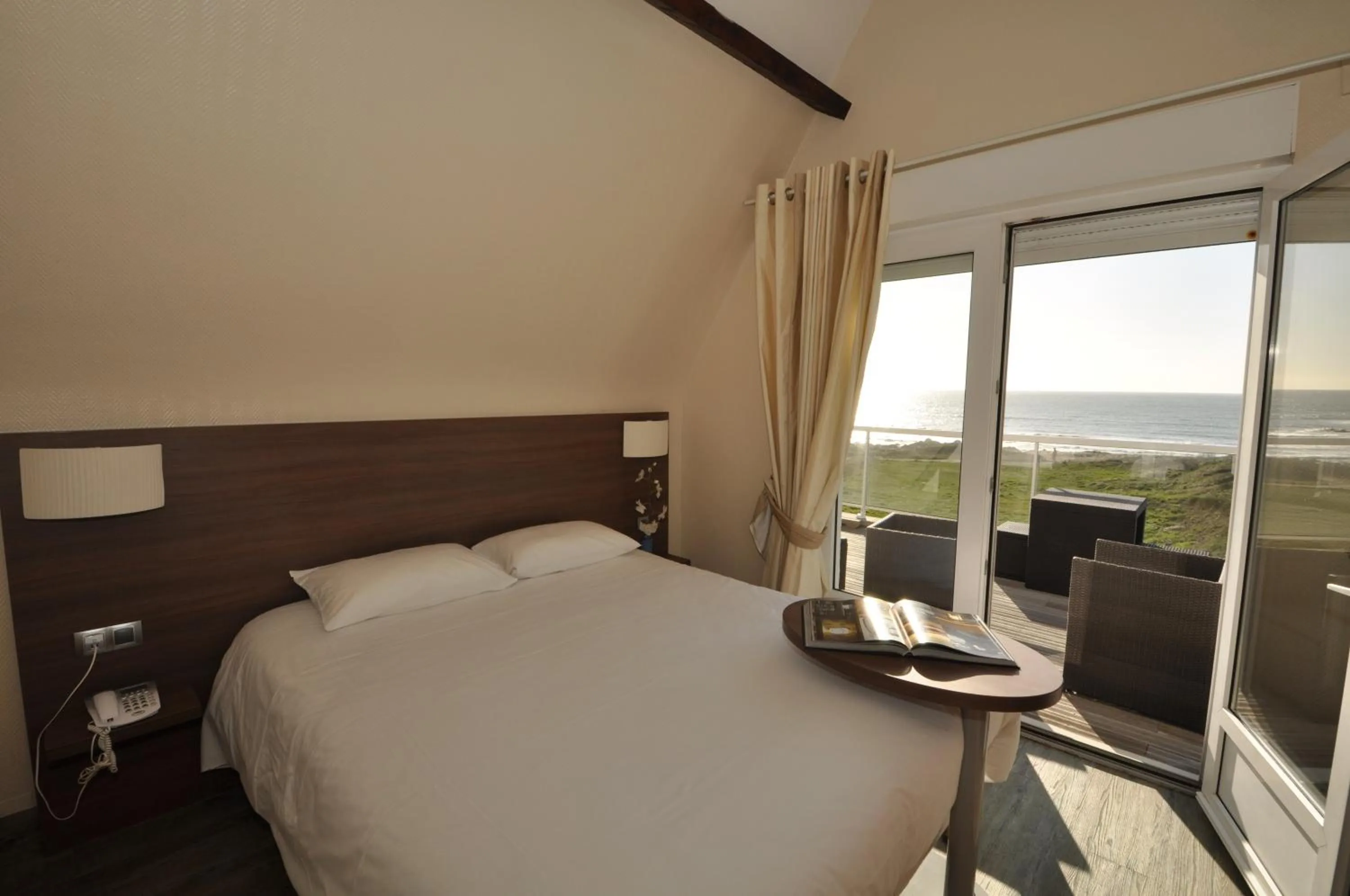 Bed in Hôtel Le Lichen De La Mer