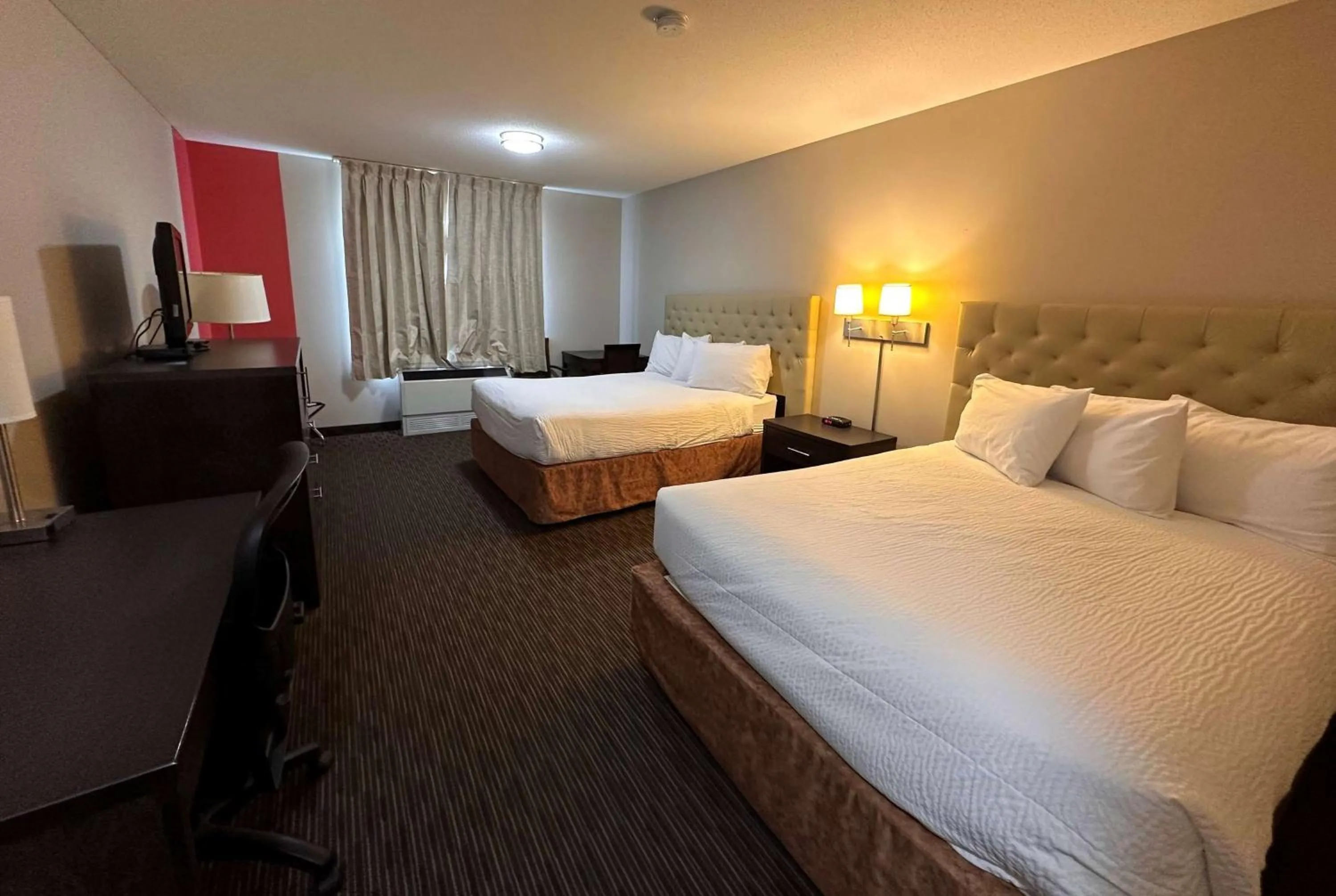 Photo of the whole room, Bed in Ramada by Wyndham Estevan