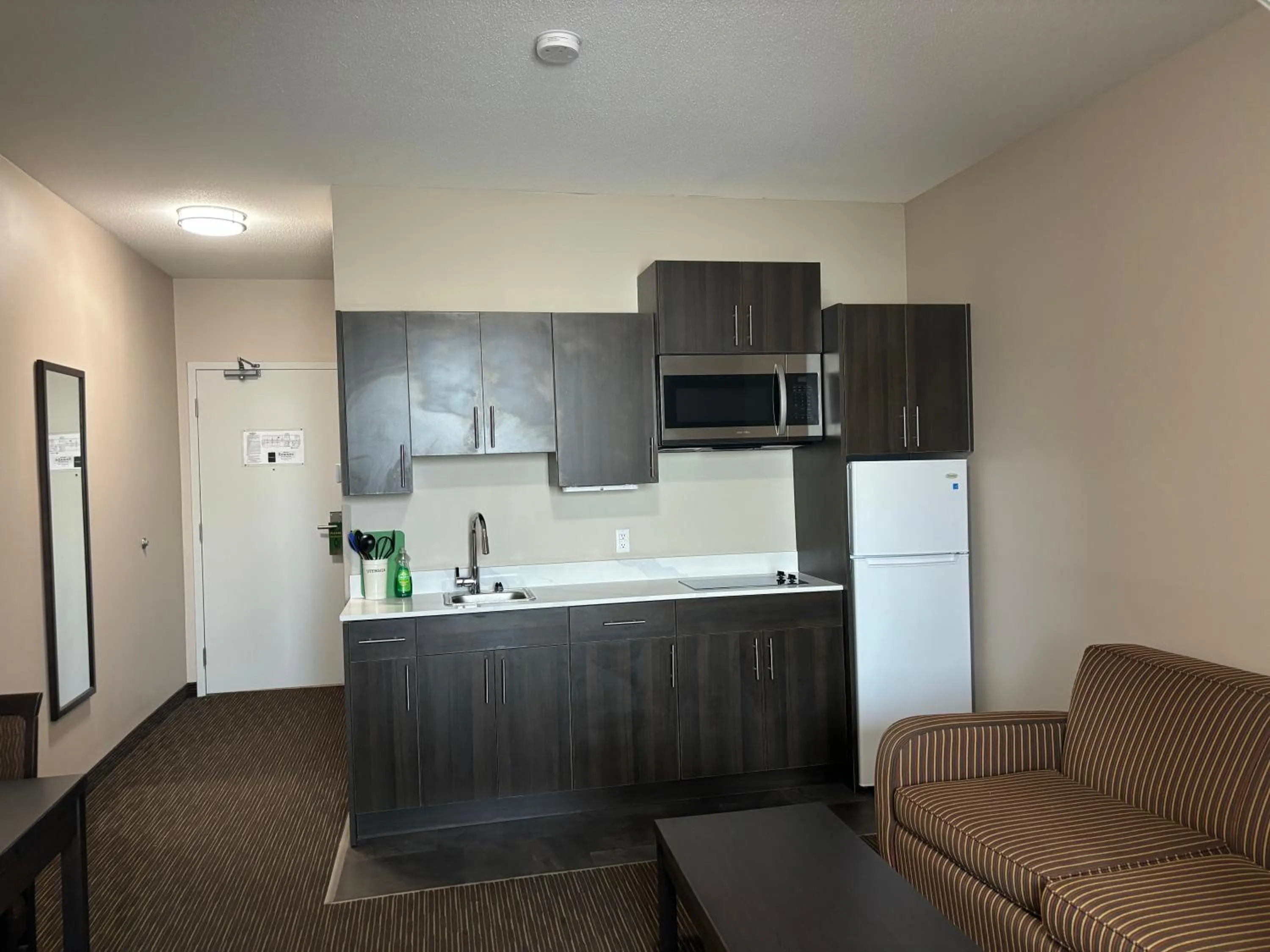 Kitchen or kitchenette in Ramada by Wyndham Estevan