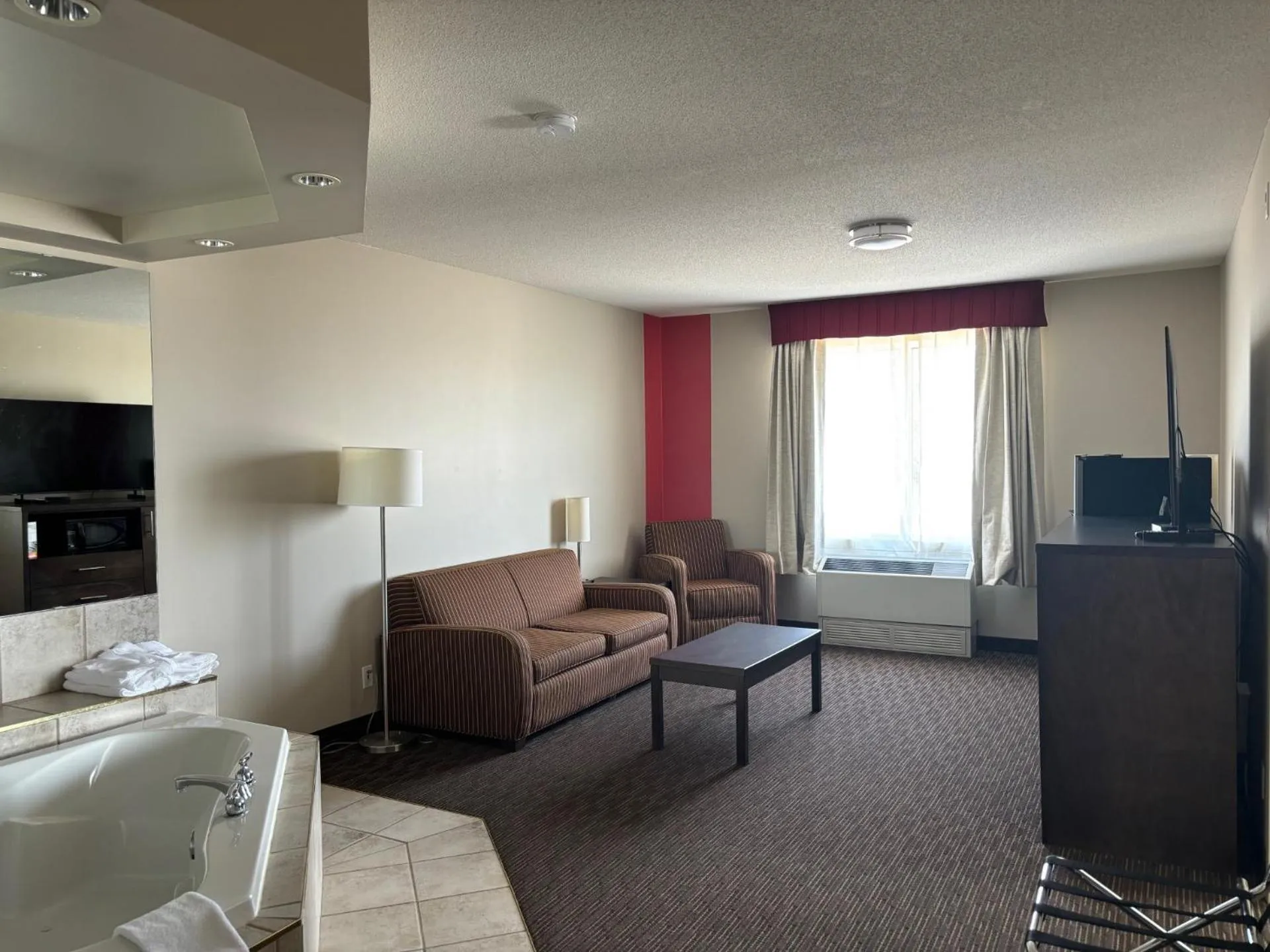 Seating area in Ramada by Wyndham Estevan