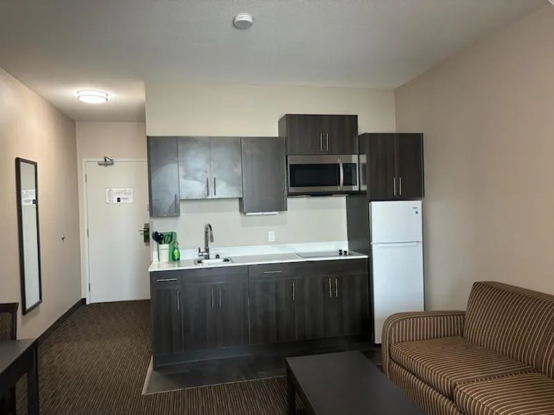 Kitchen or kitchenette in Ramada by Wyndham Estevan