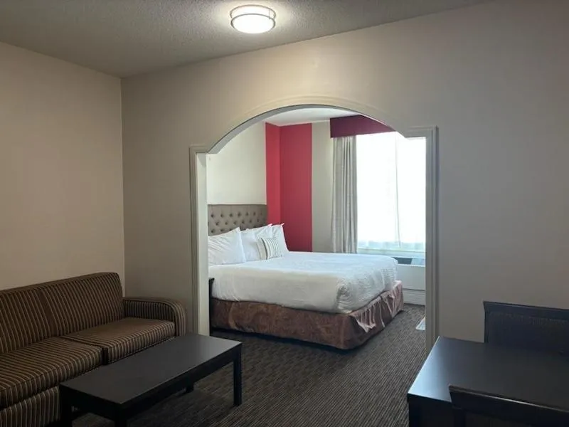 Photo of the whole room, Bed in Ramada by Wyndham Estevan