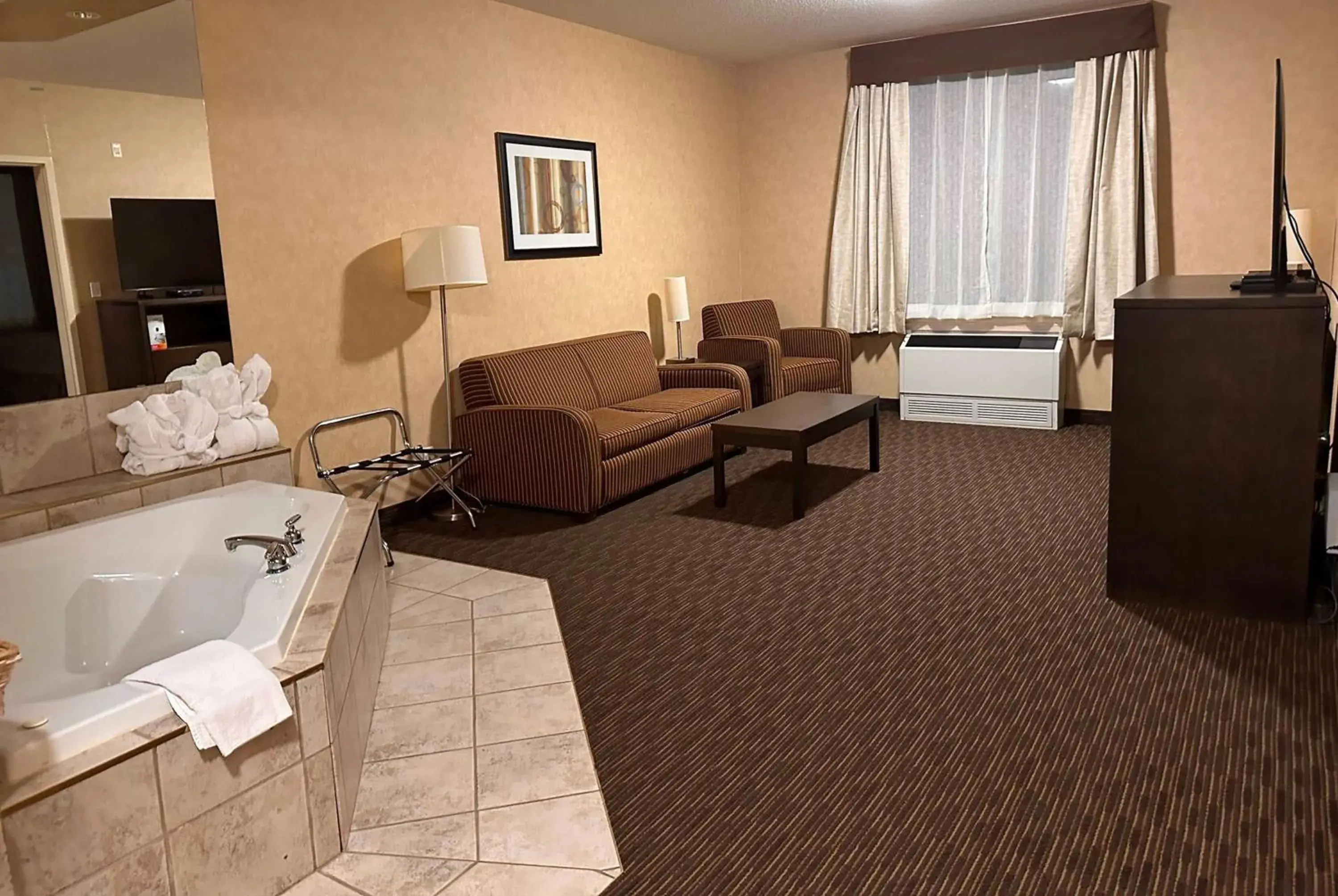Photo of the whole room in Ramada by Wyndham Estevan Photo of the whole room in Ramada by Wyndham Estevan