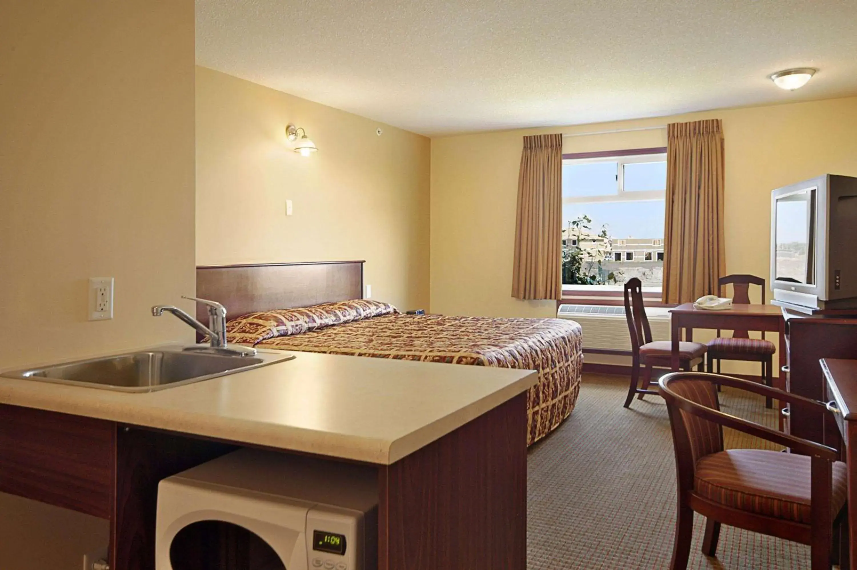 Photo of the whole room in Super 8 by Wyndham Fort Saskatchewan Photo of the whole room in Super 8 by Wyndham Fort Saskatchewan