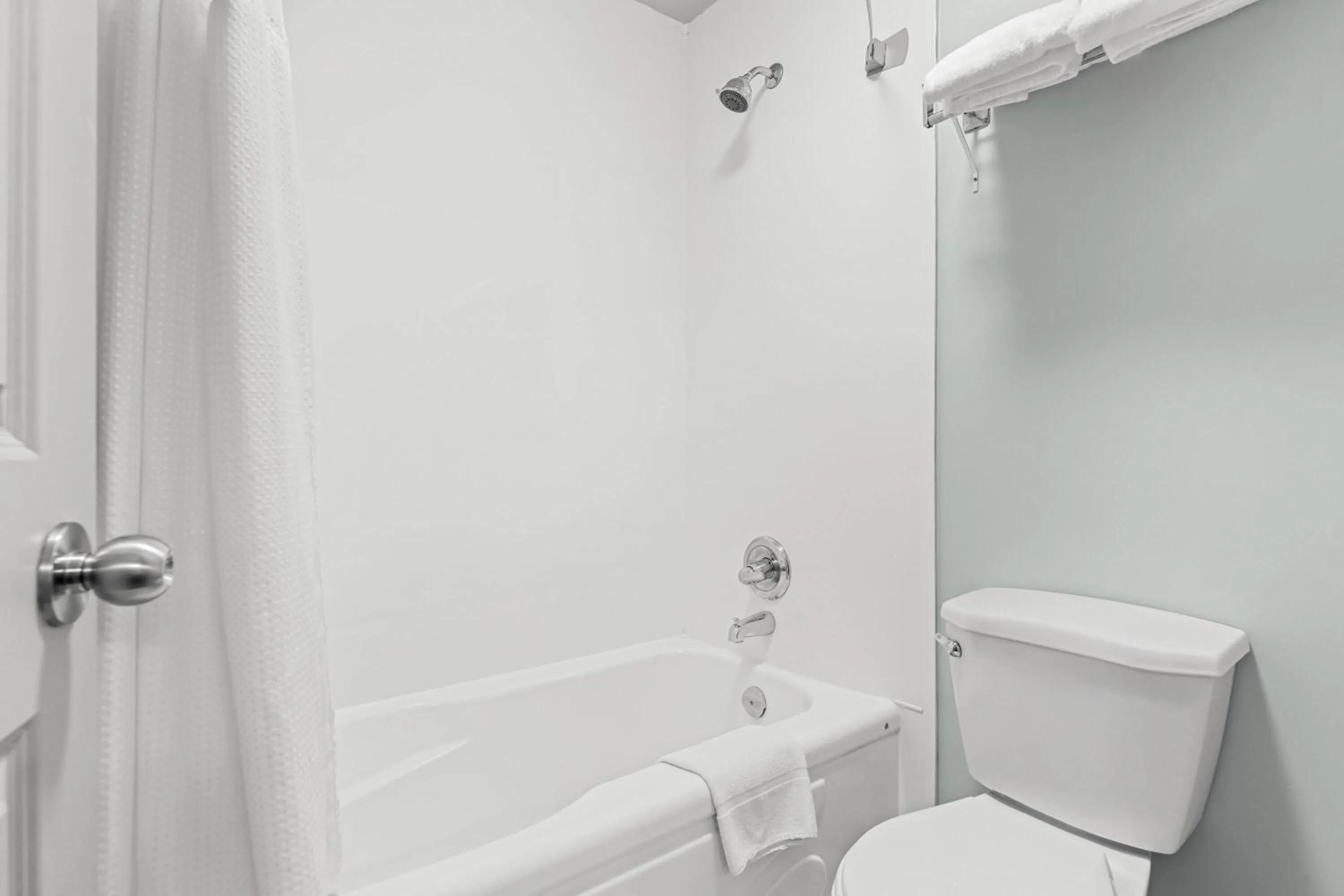 Bathroom in Super 8 by Wyndham Saskatoon Near Saskatoon Airport