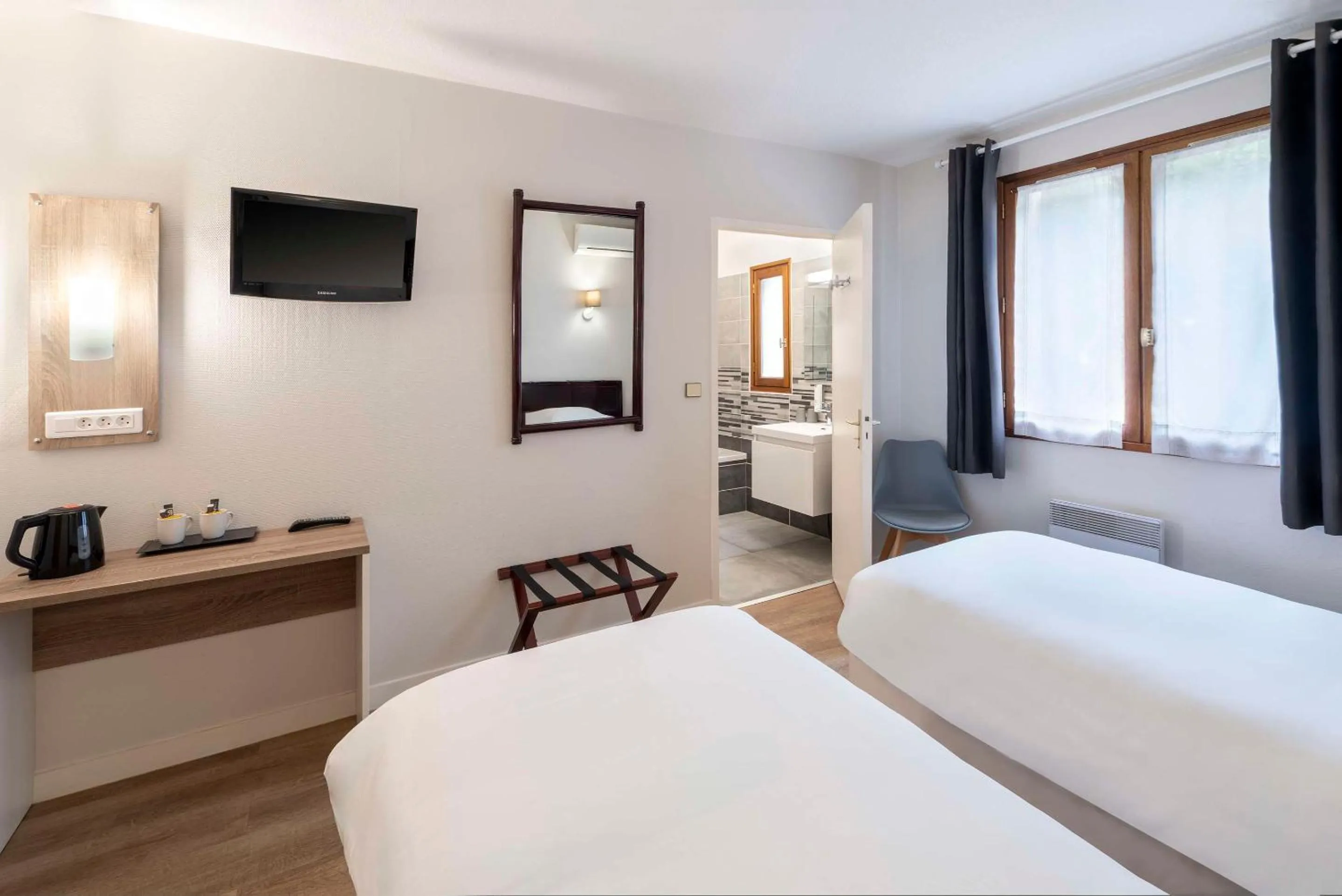 Bedroom, Bed in Sure Hotel by Best Western Saintes