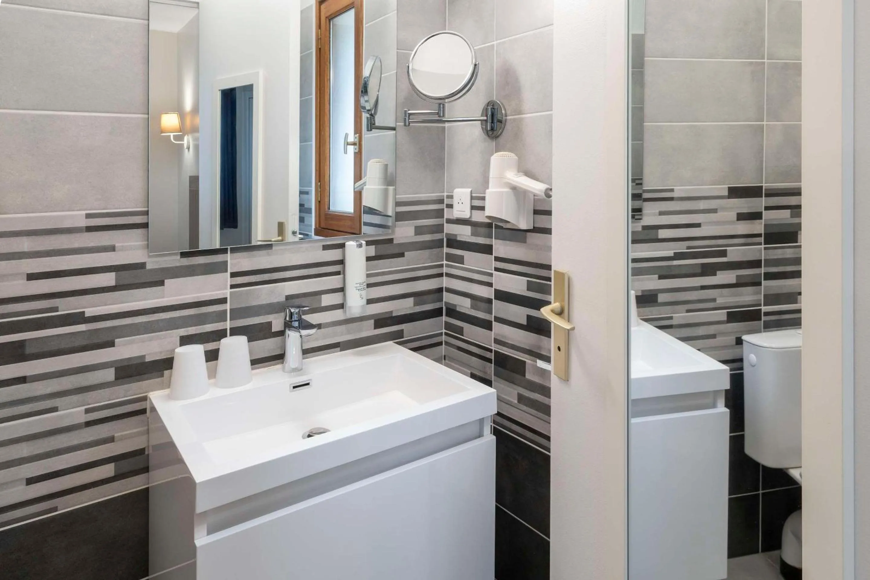 Bathroom in Sure Hotel by Best Western Saintes