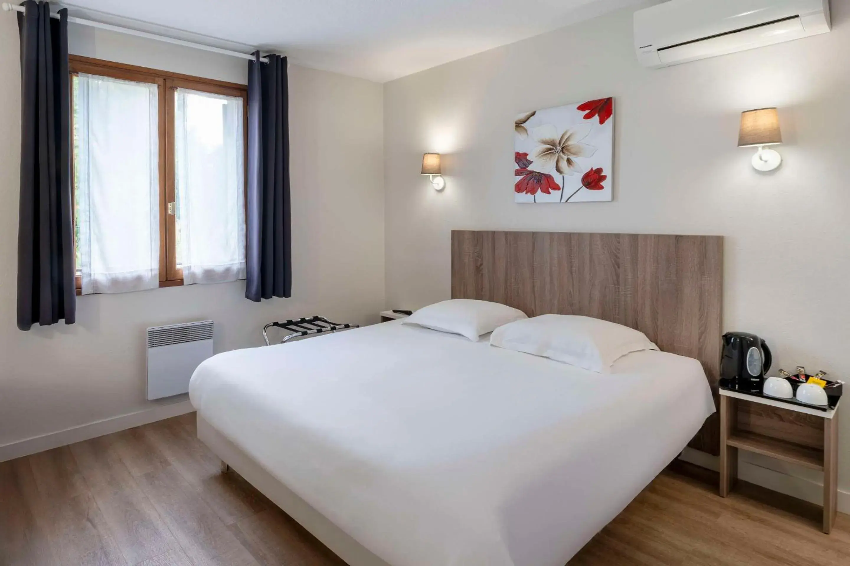 Bedroom, Bed in Sure Hotel by Best Western Saintes Bedroom, Bed in Sure Hotel by Best Western Saintes
