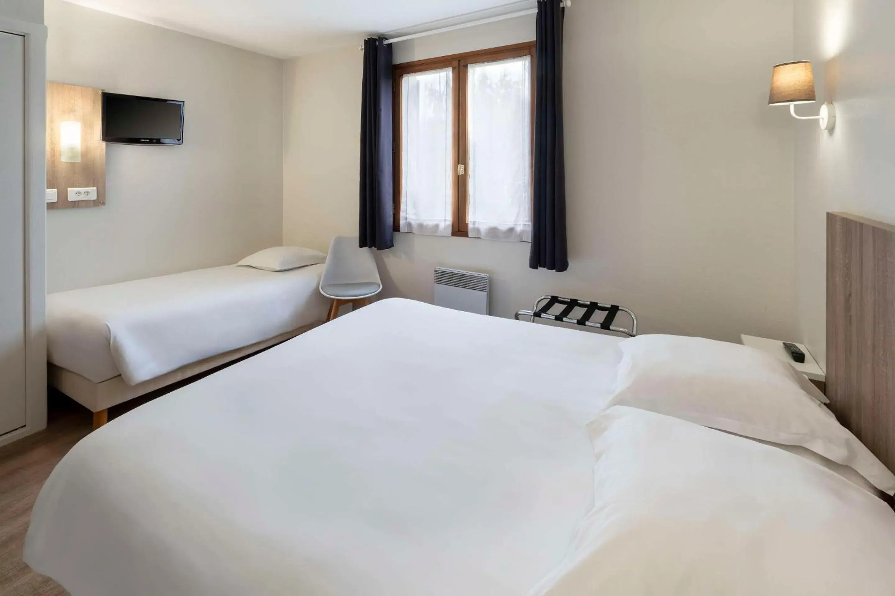 Bedroom, Bed in Sure Hotel by Best Western Saintes Bedroom, Bed in Sure Hotel by Best Western Saintes