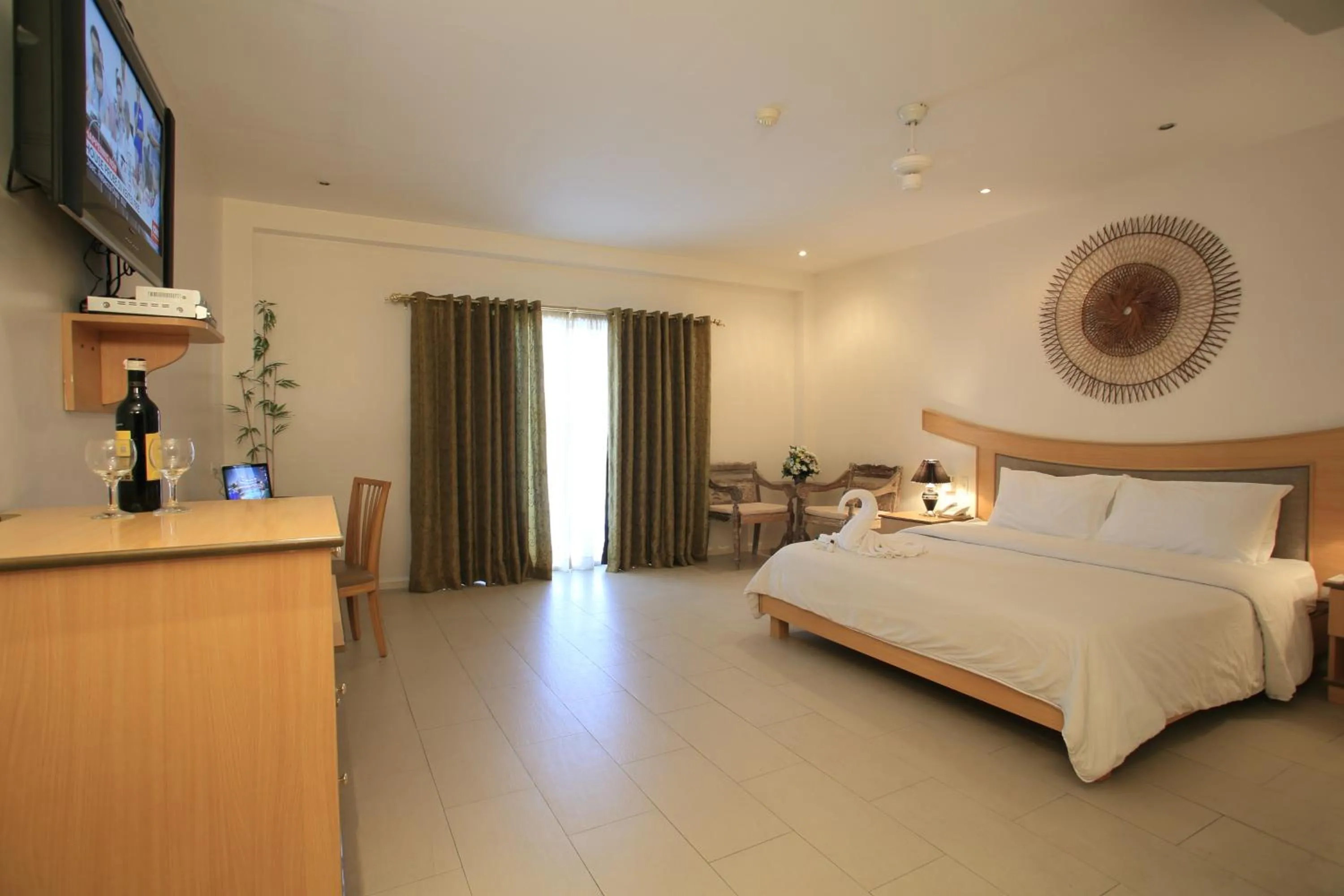 Photo of the whole room, Bed in Wild Orchid Beach Resort