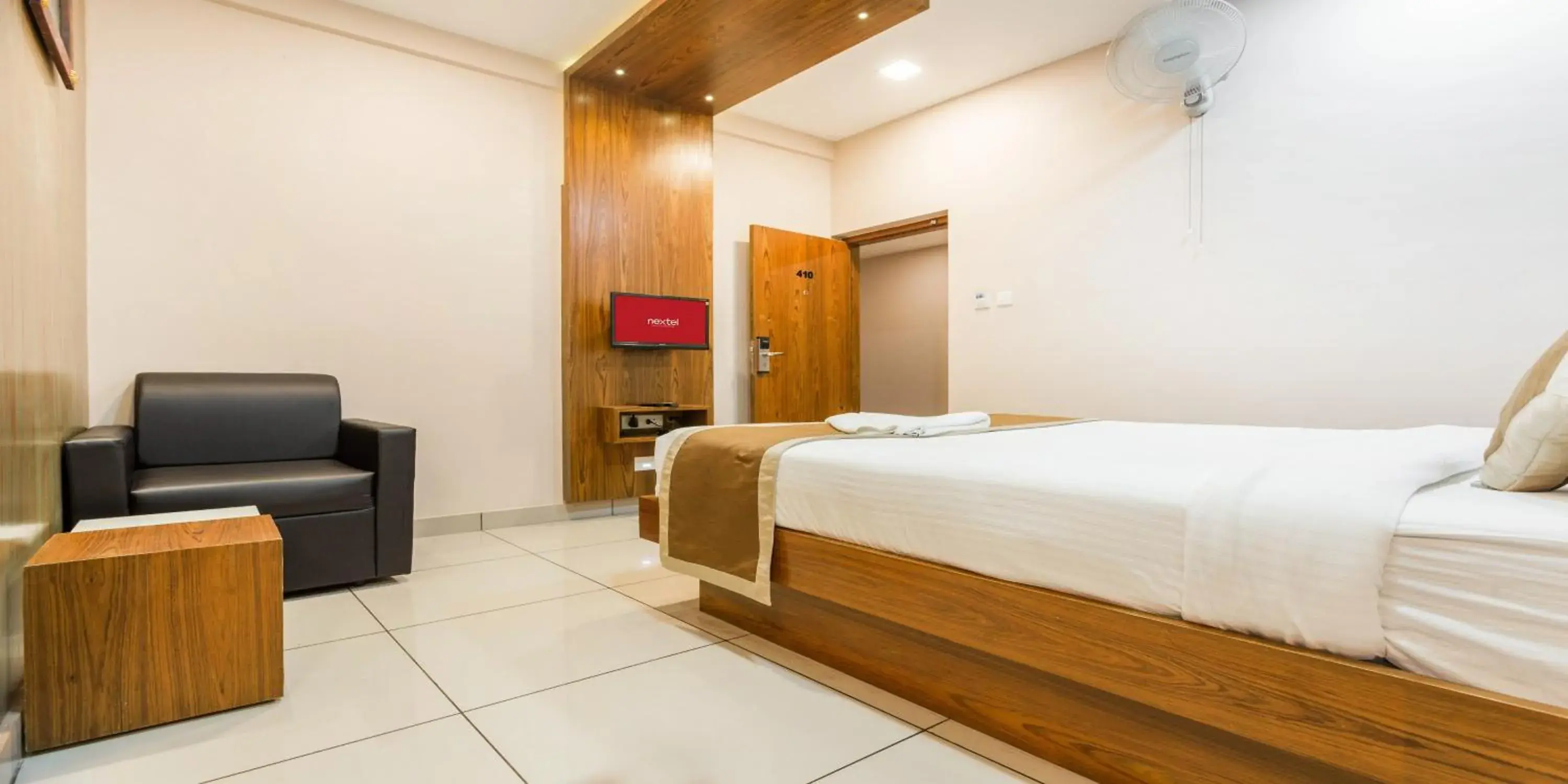 Photo of the whole room, Bed in Nextel Inn, Calicut Photo of the whole room, Bed in Nextel Inn, Calicut