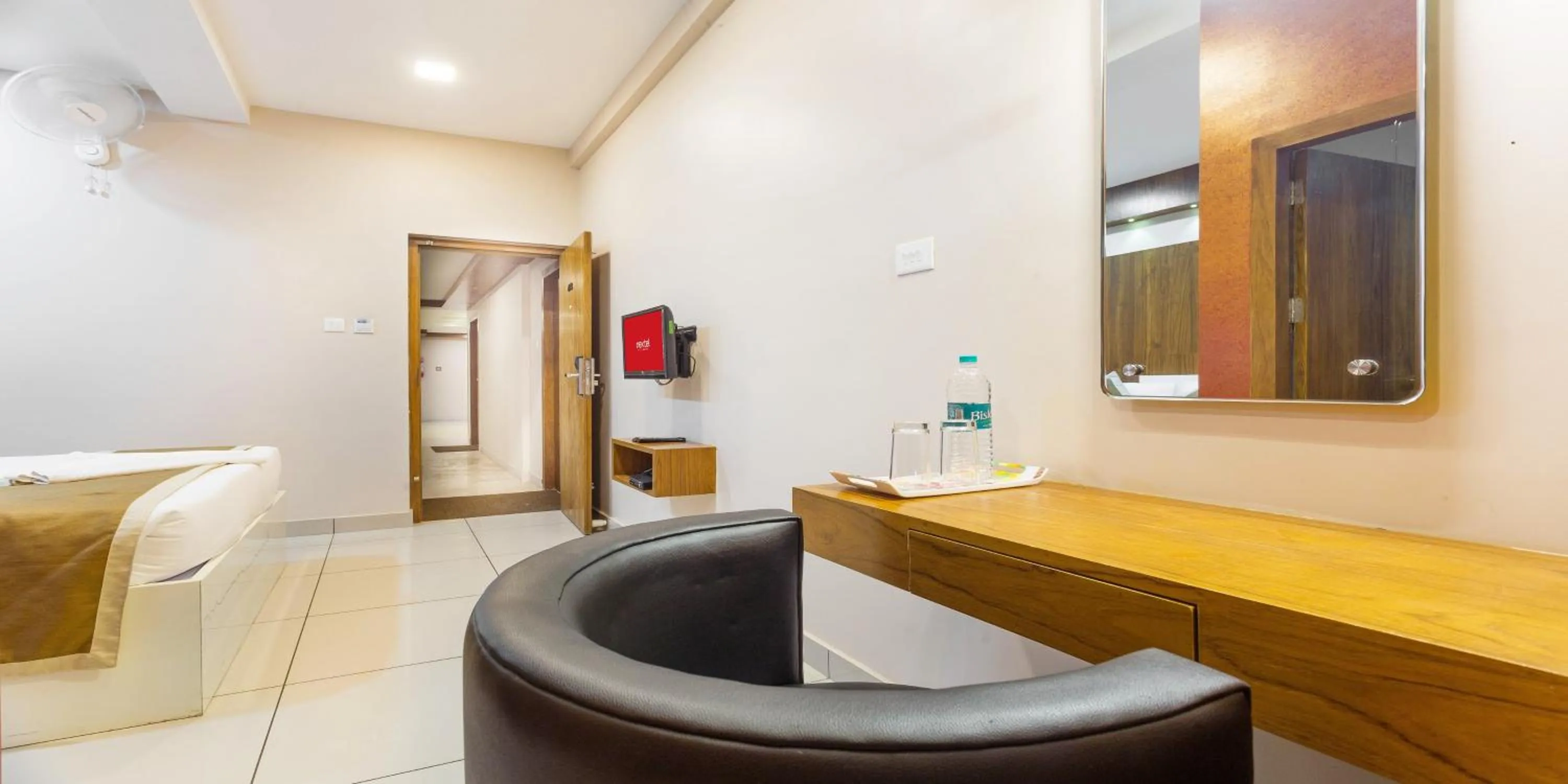 Bathroom, Bed in Nextel Inn, Calicut