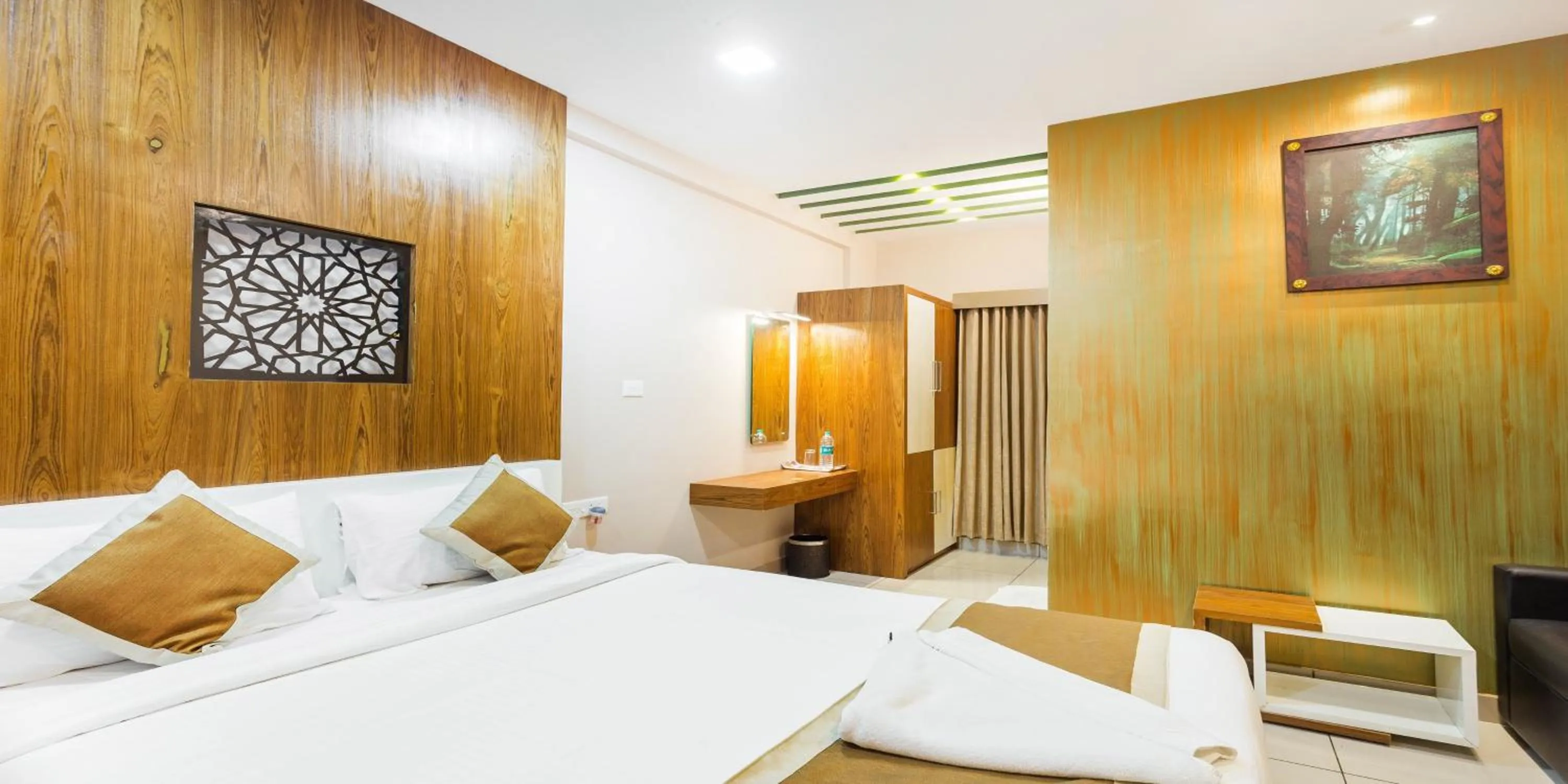 Photo of the whole room, Bed in Nextel Inn, Calicut