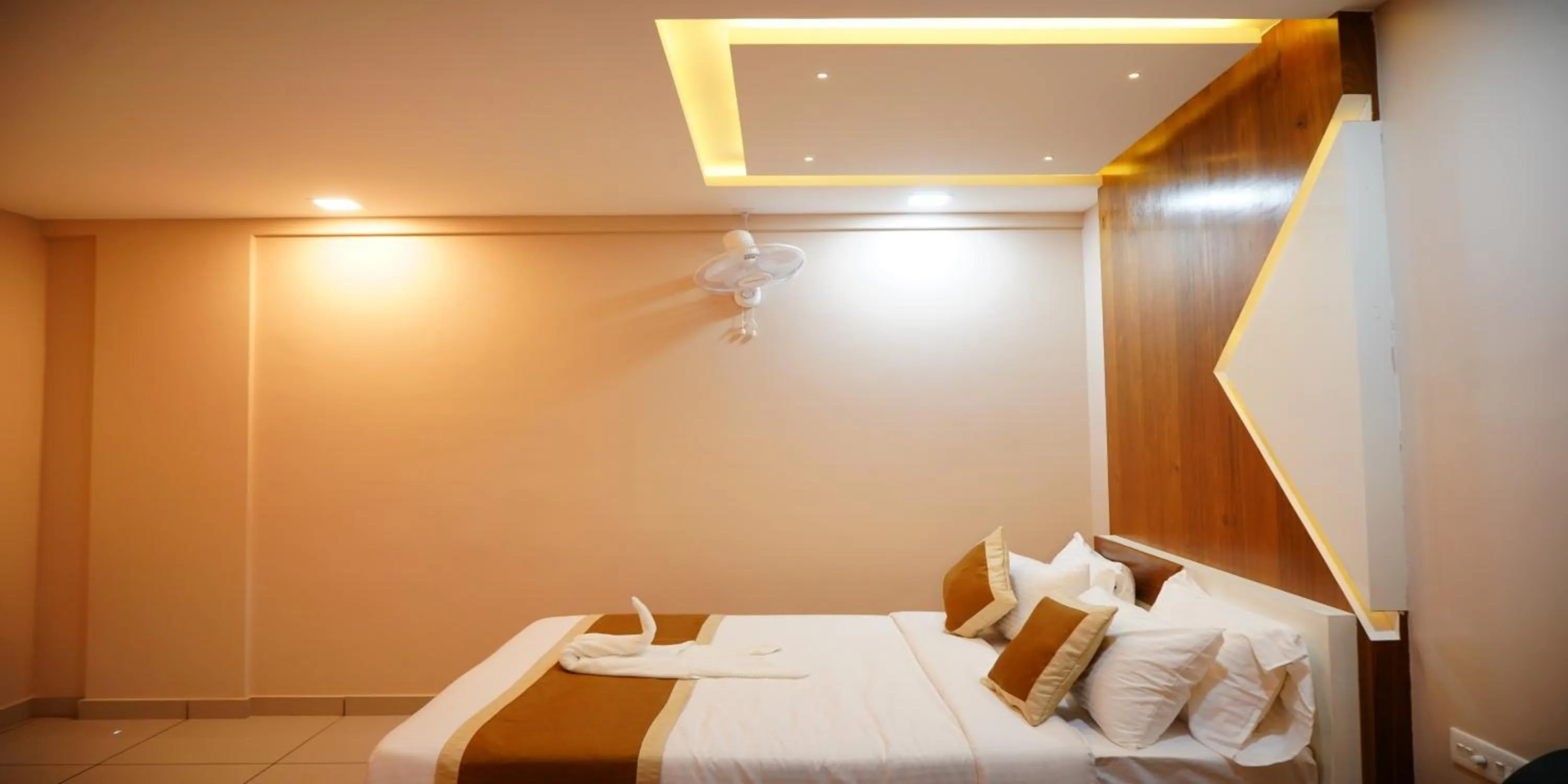 Bed in Nextel Inn, Calicut