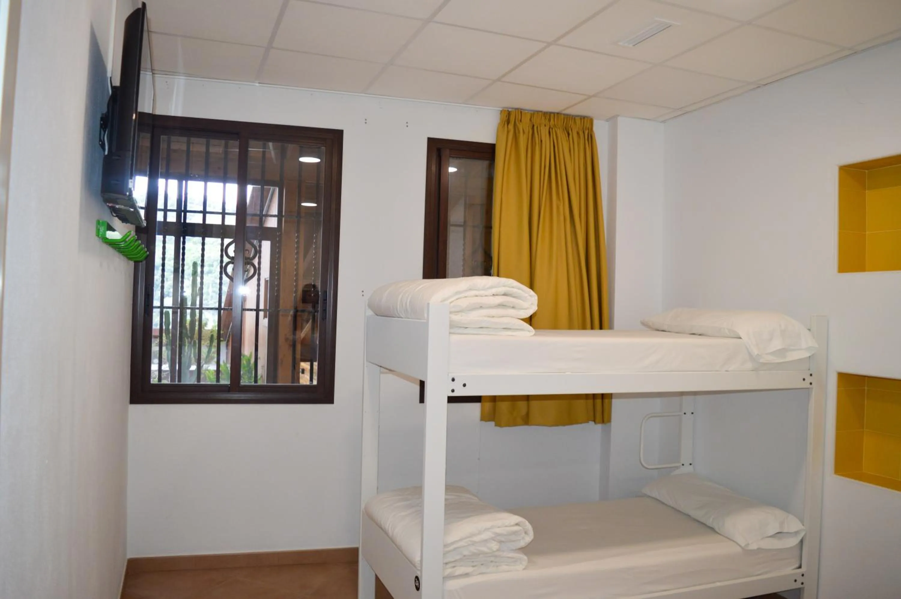 Bed in Benarrabá Hostel