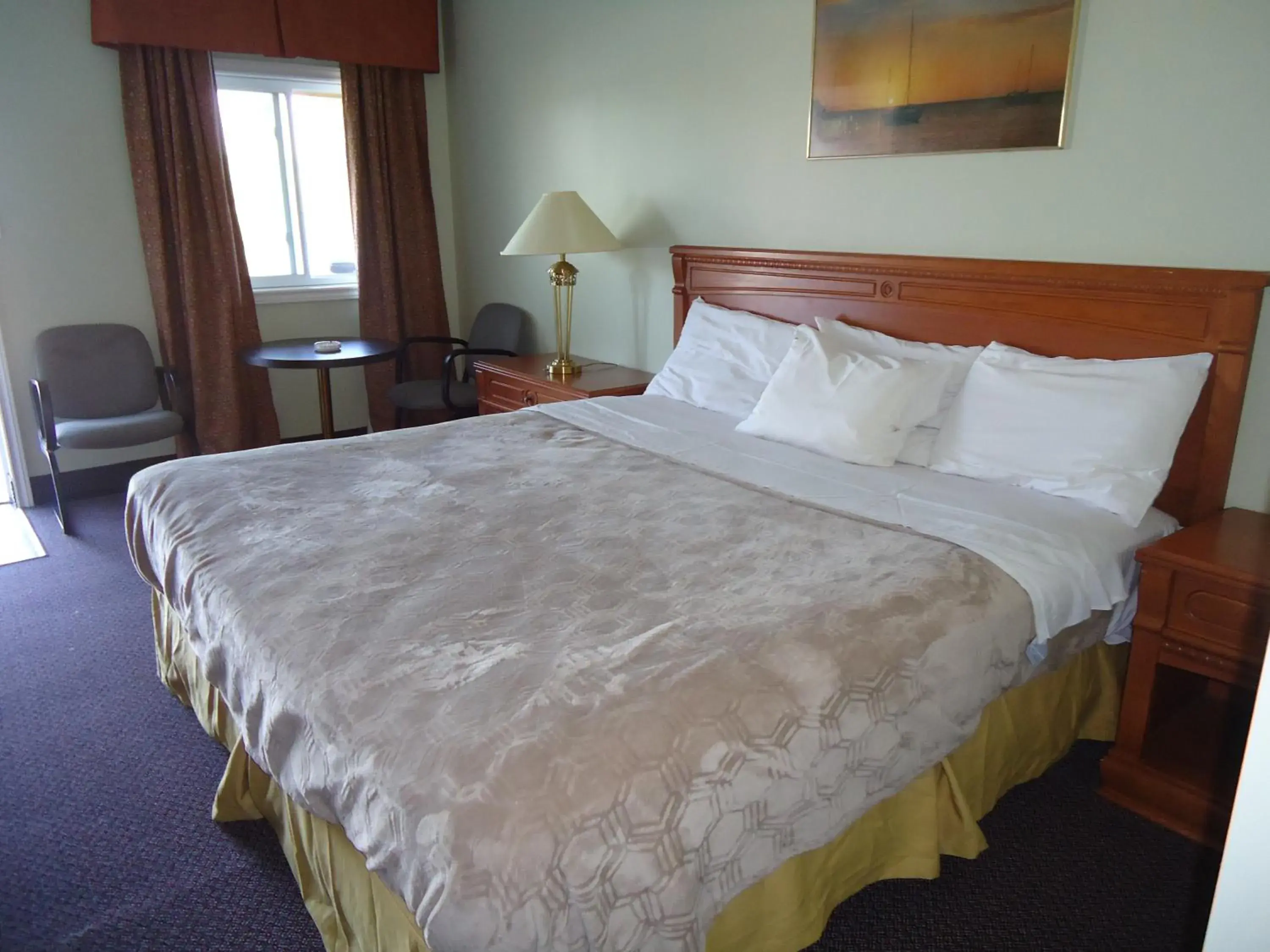 Bed in Westmount Motel