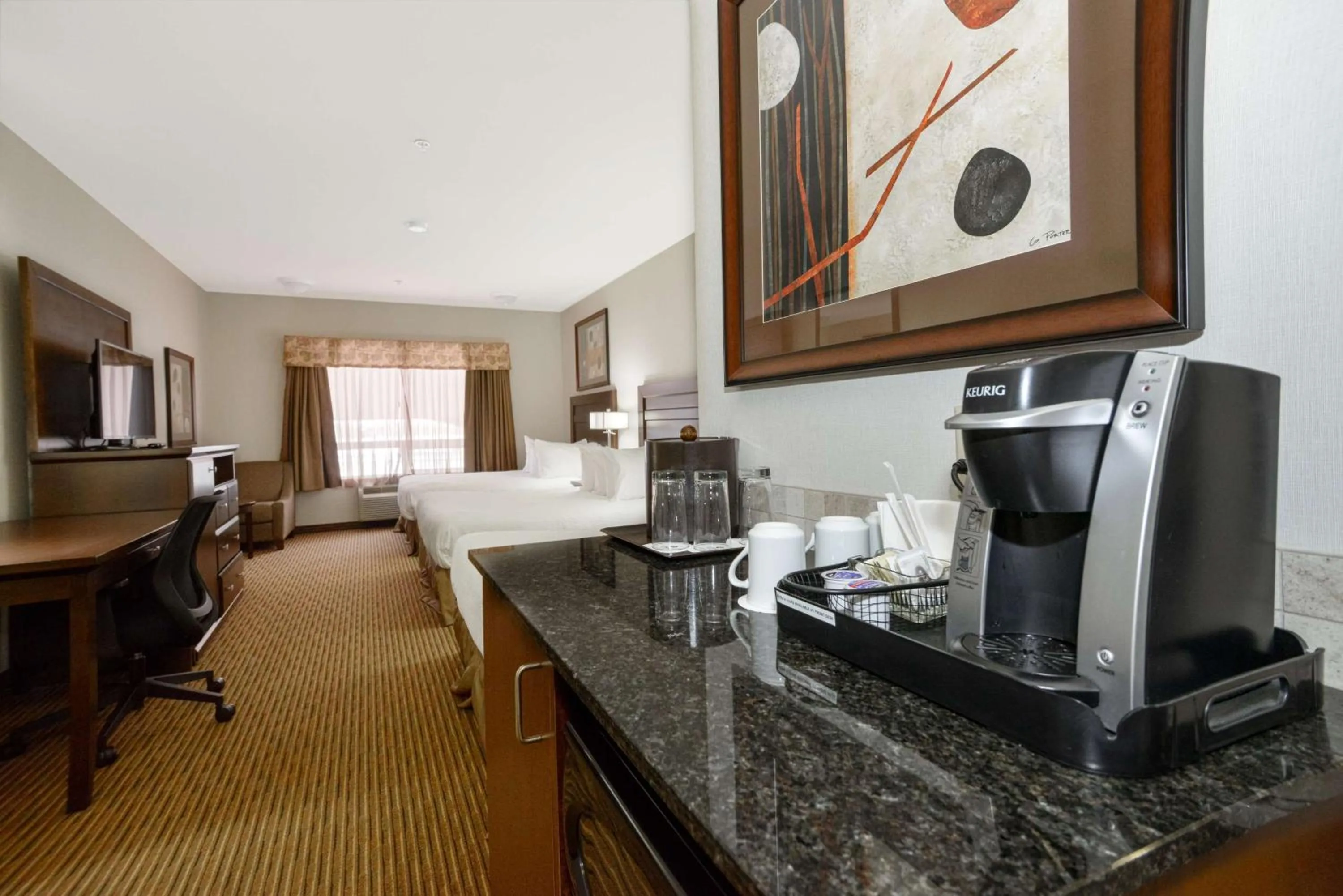 Bedroom in Coast Weyburn Hotel