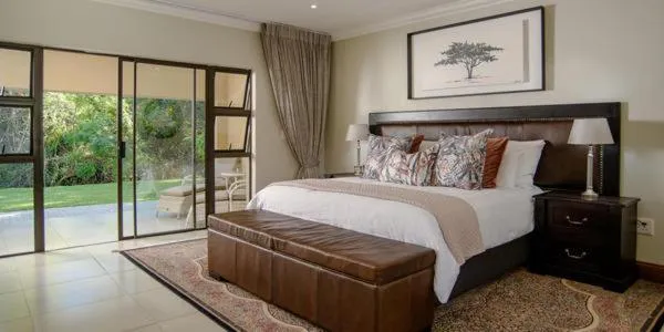 Bed in The Reserve Boutique Hotel