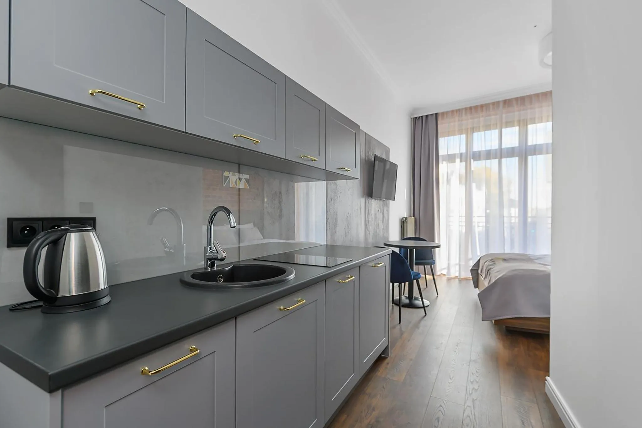 Kitchen or kitchenette in Aparthotel Krzywa Kamienica