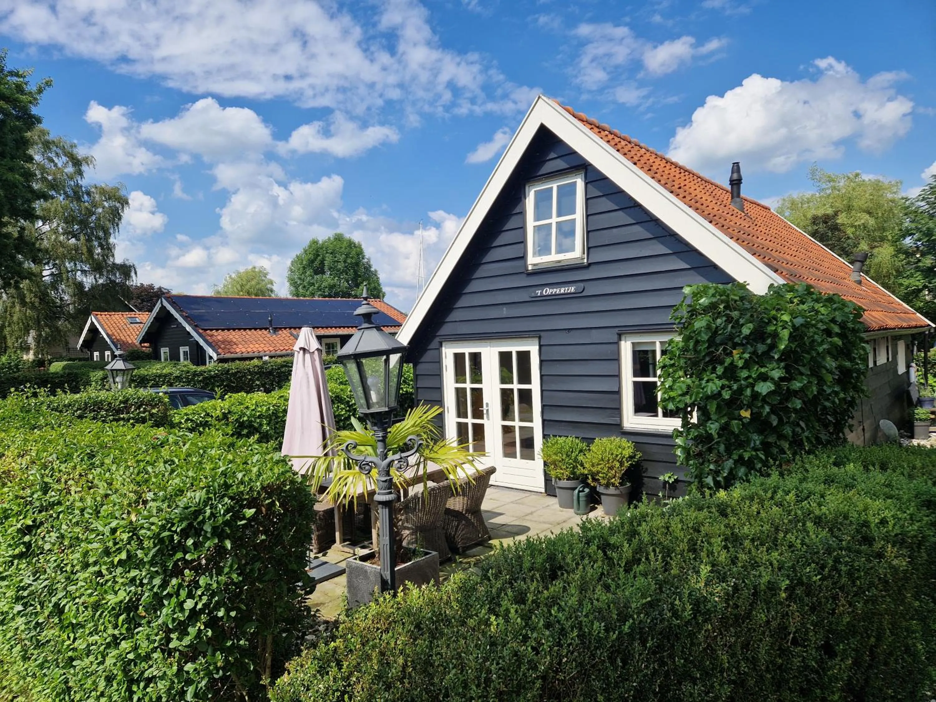 Garden in d'Oude Herbergh, vakantiehuizen aan het water