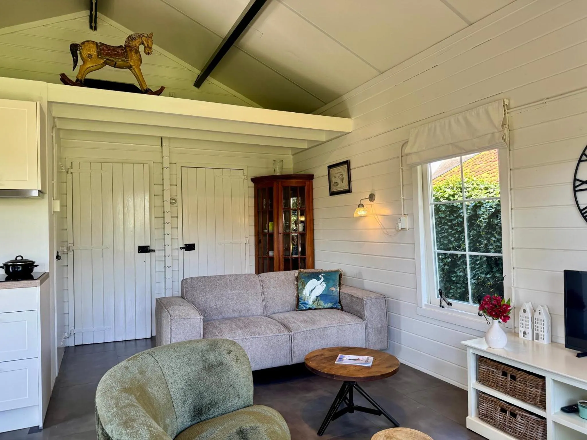 Seating area in d'Oude Herbergh, vakantiehuizen aan het water