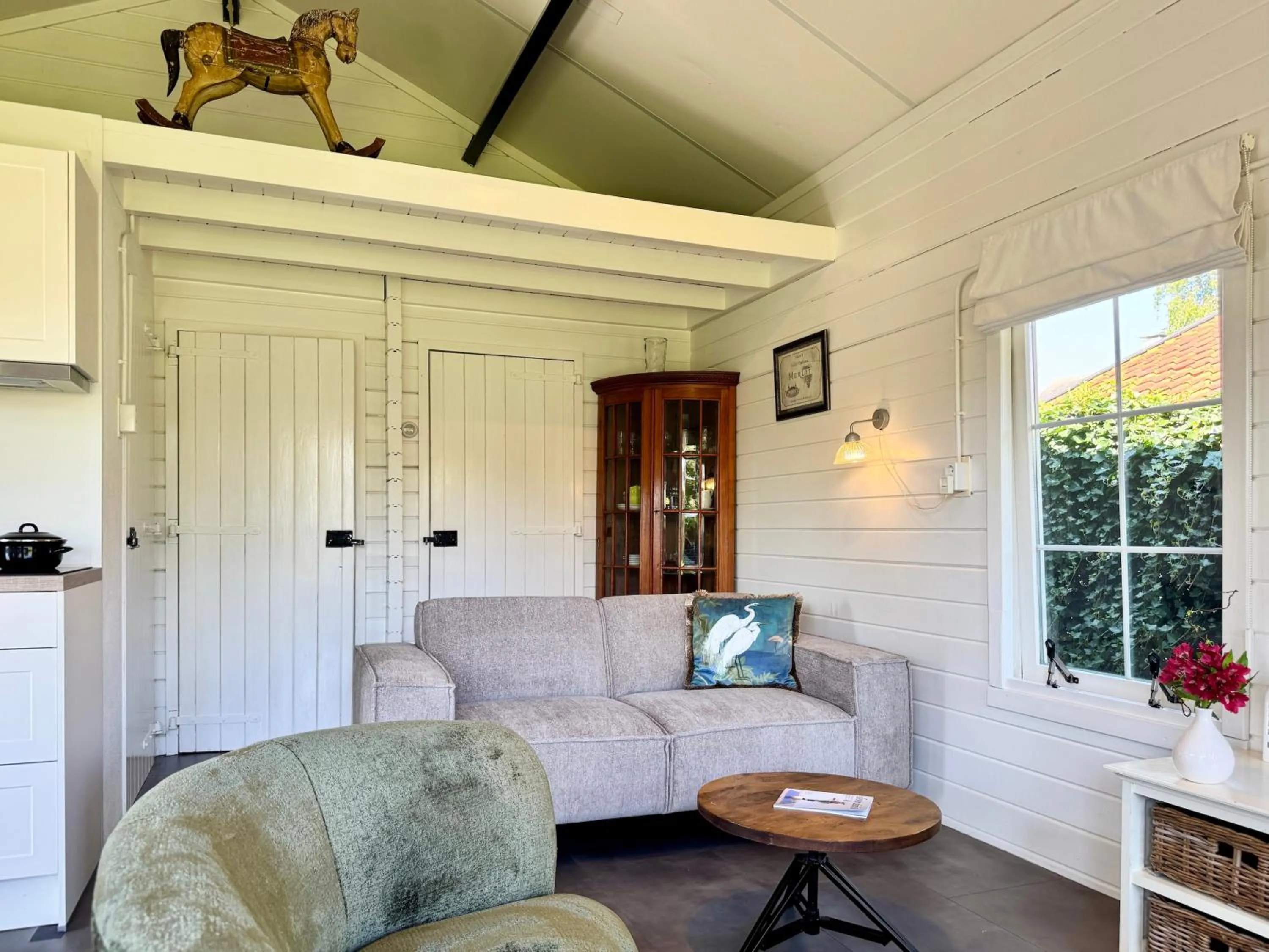 Seating area in d'Oude Herbergh, vakantiehuizen aan het water