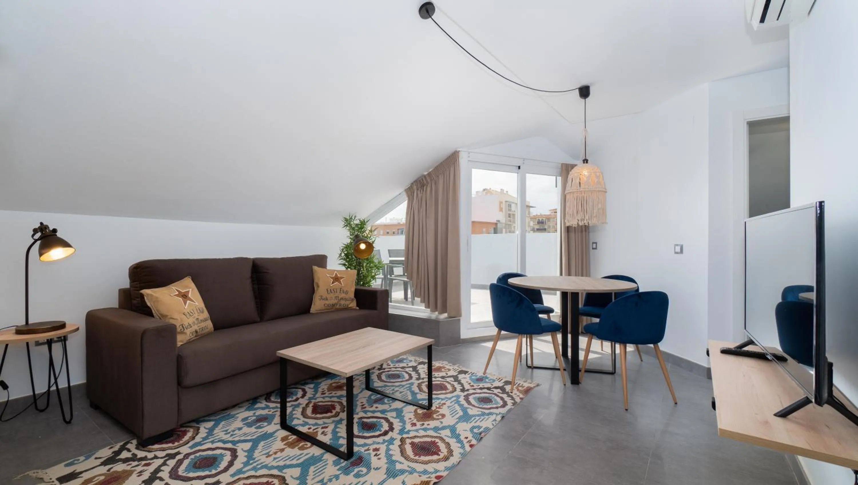 Living room in Sur Suites La Dorada, centricos soleados a pocos metros de la Playa y con Parking Opcional