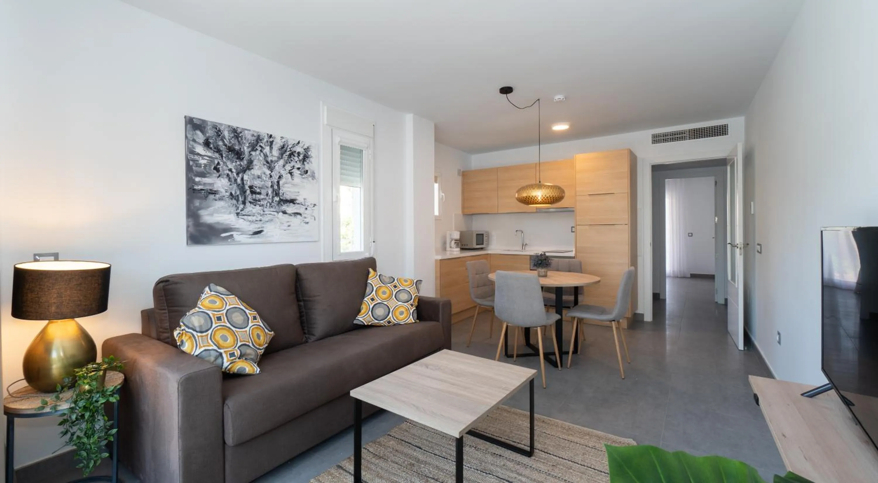 Living room in Sur Suites La Dorada, centricos soleados a pocos metros de la Playa y con Parking Opcional