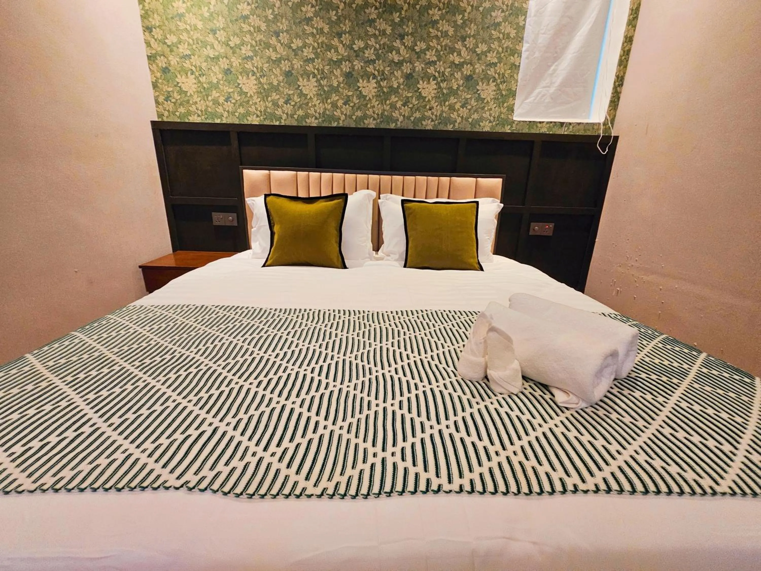 Bed in Carnarvon Suites