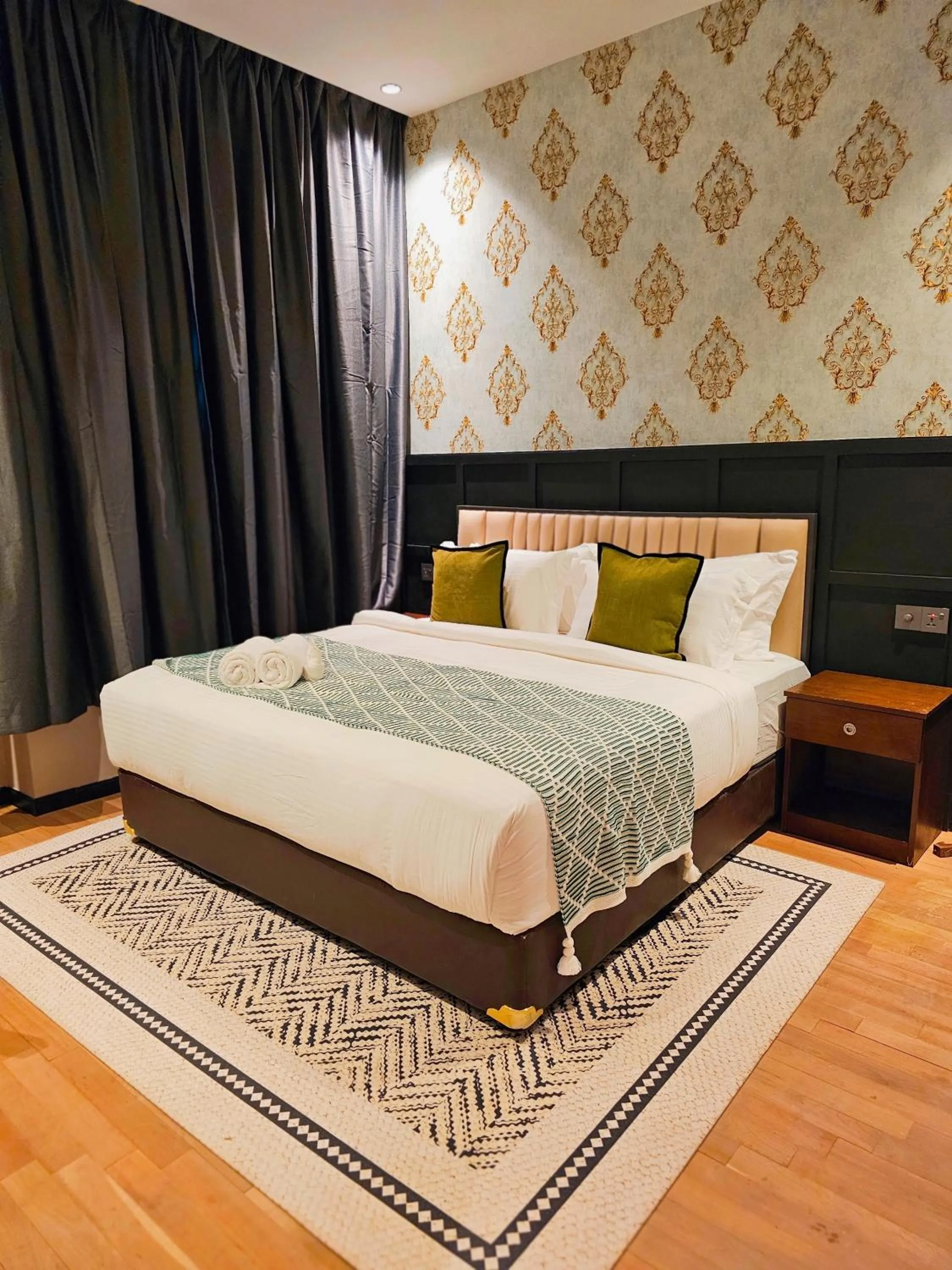 Bed in Carnarvon Suites