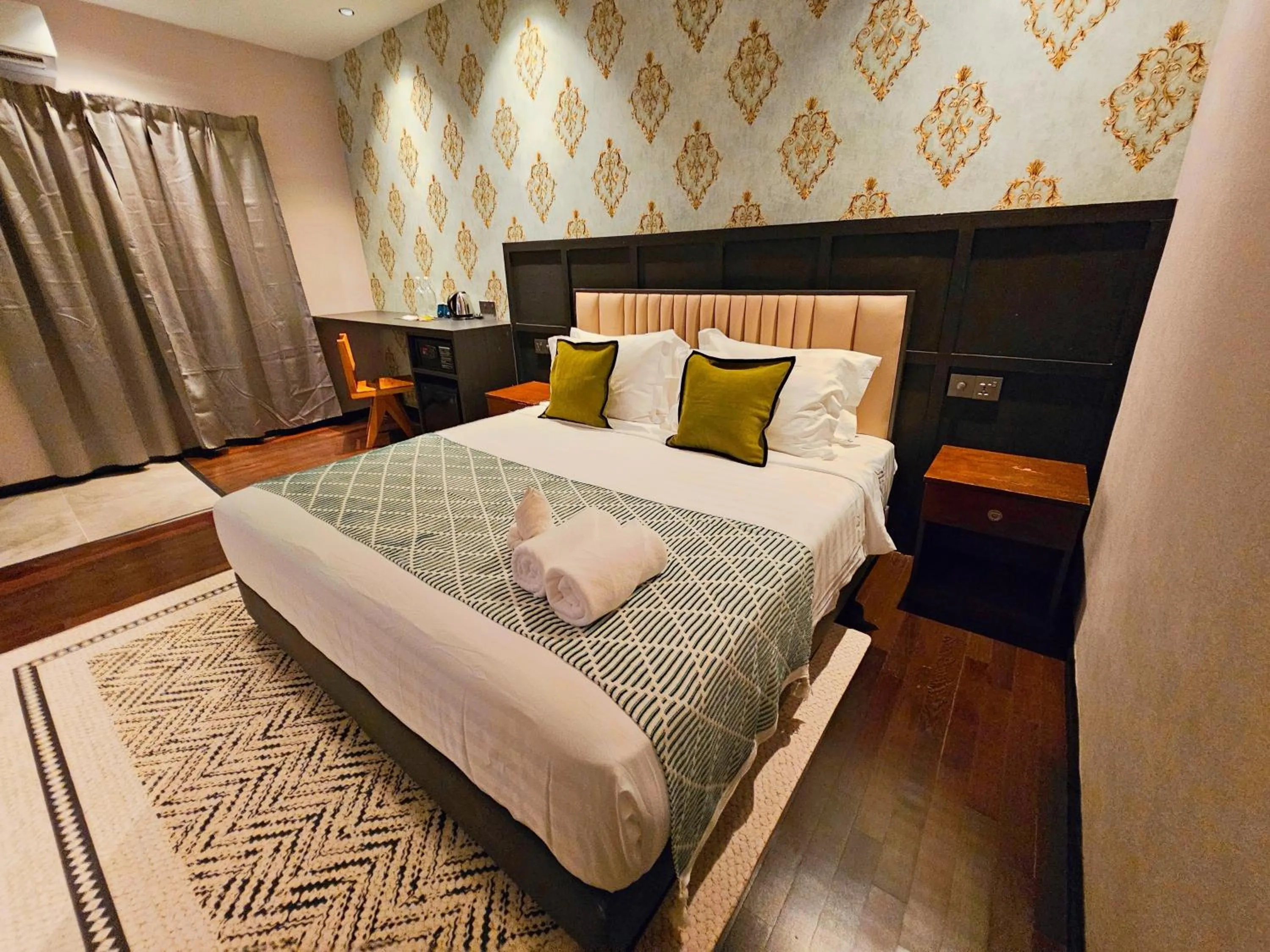 Bed in Carnarvon Suites