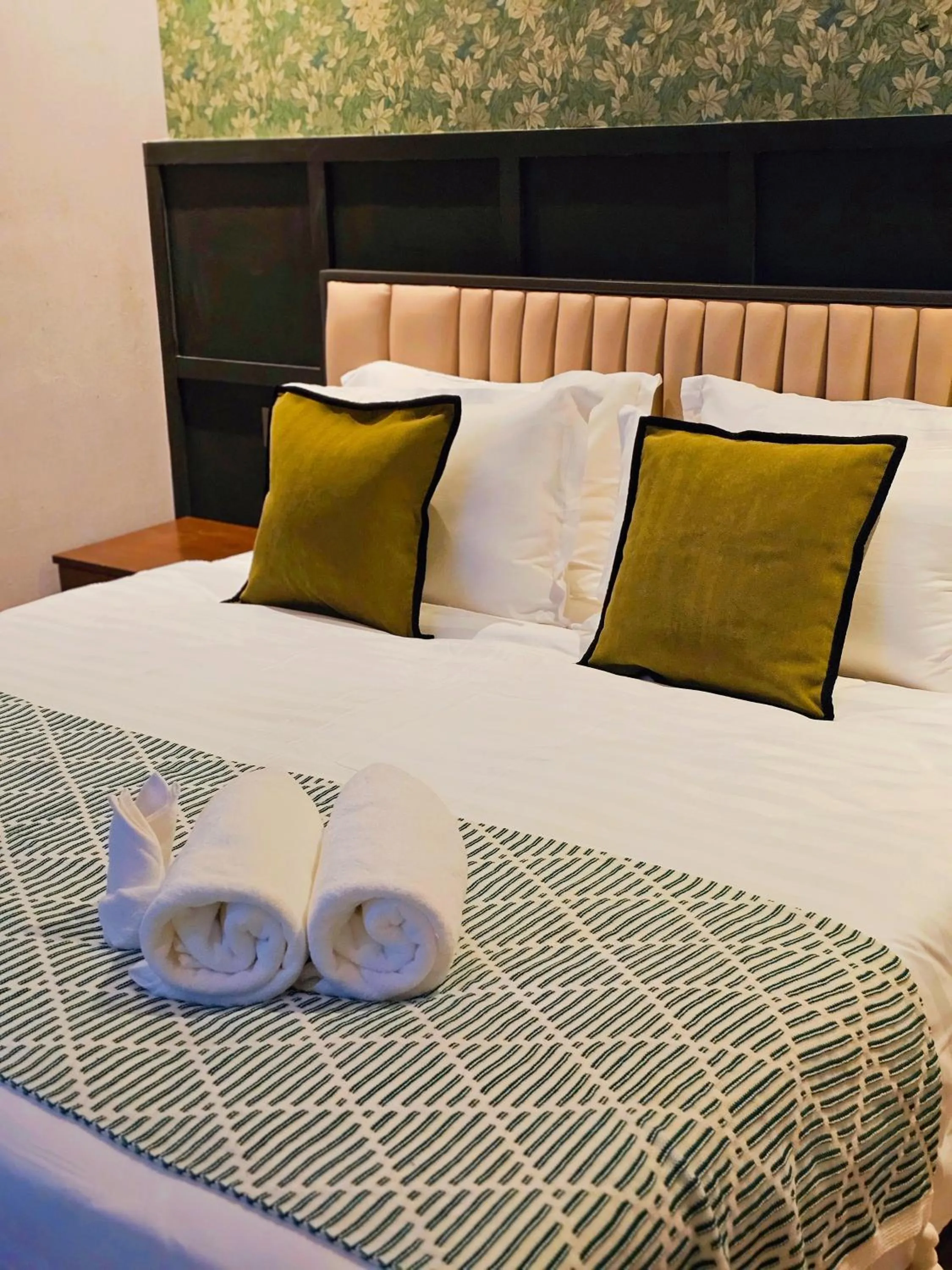 Bed in Carnarvon Suites