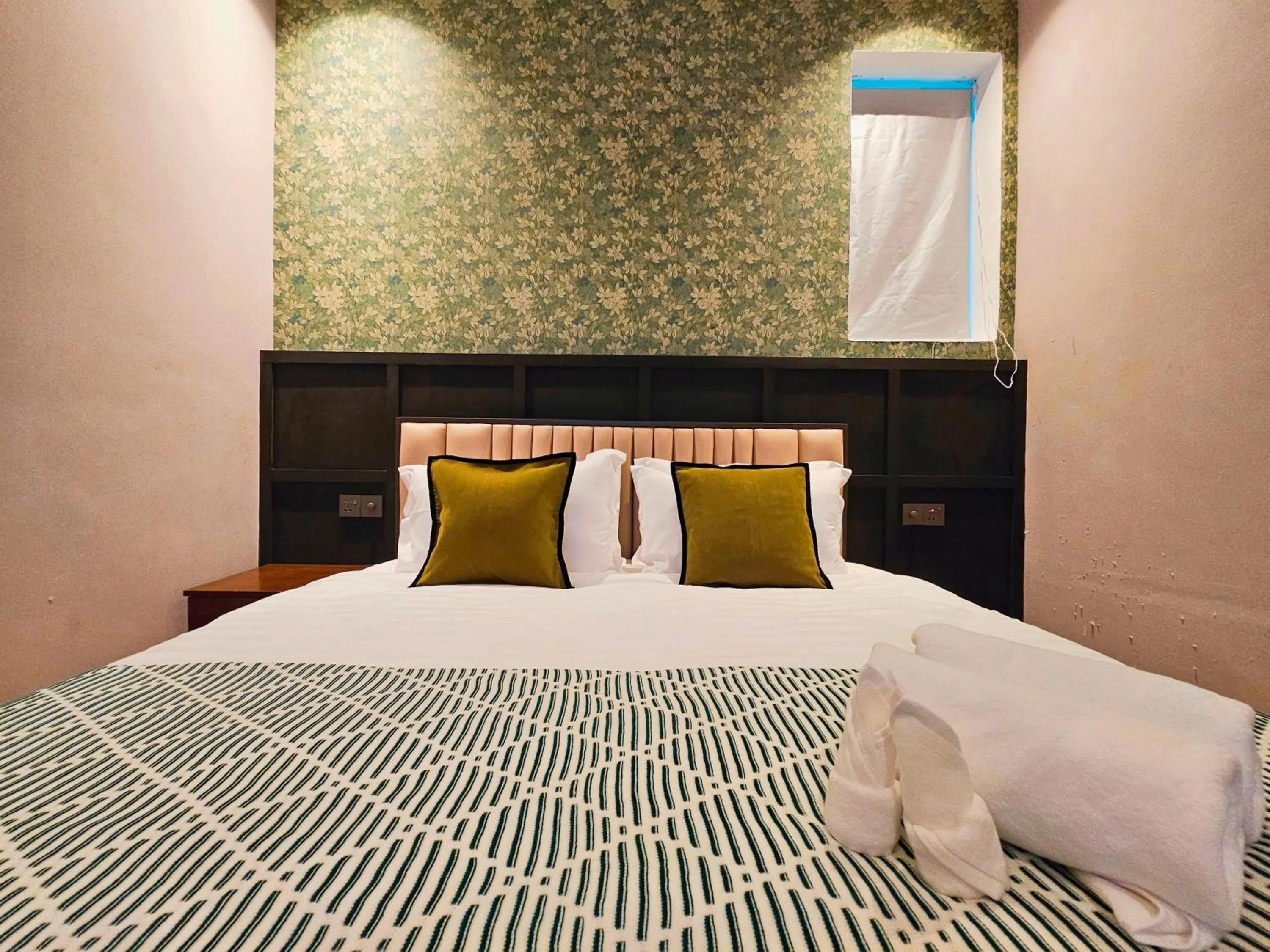 Bed in Carnarvon Suites