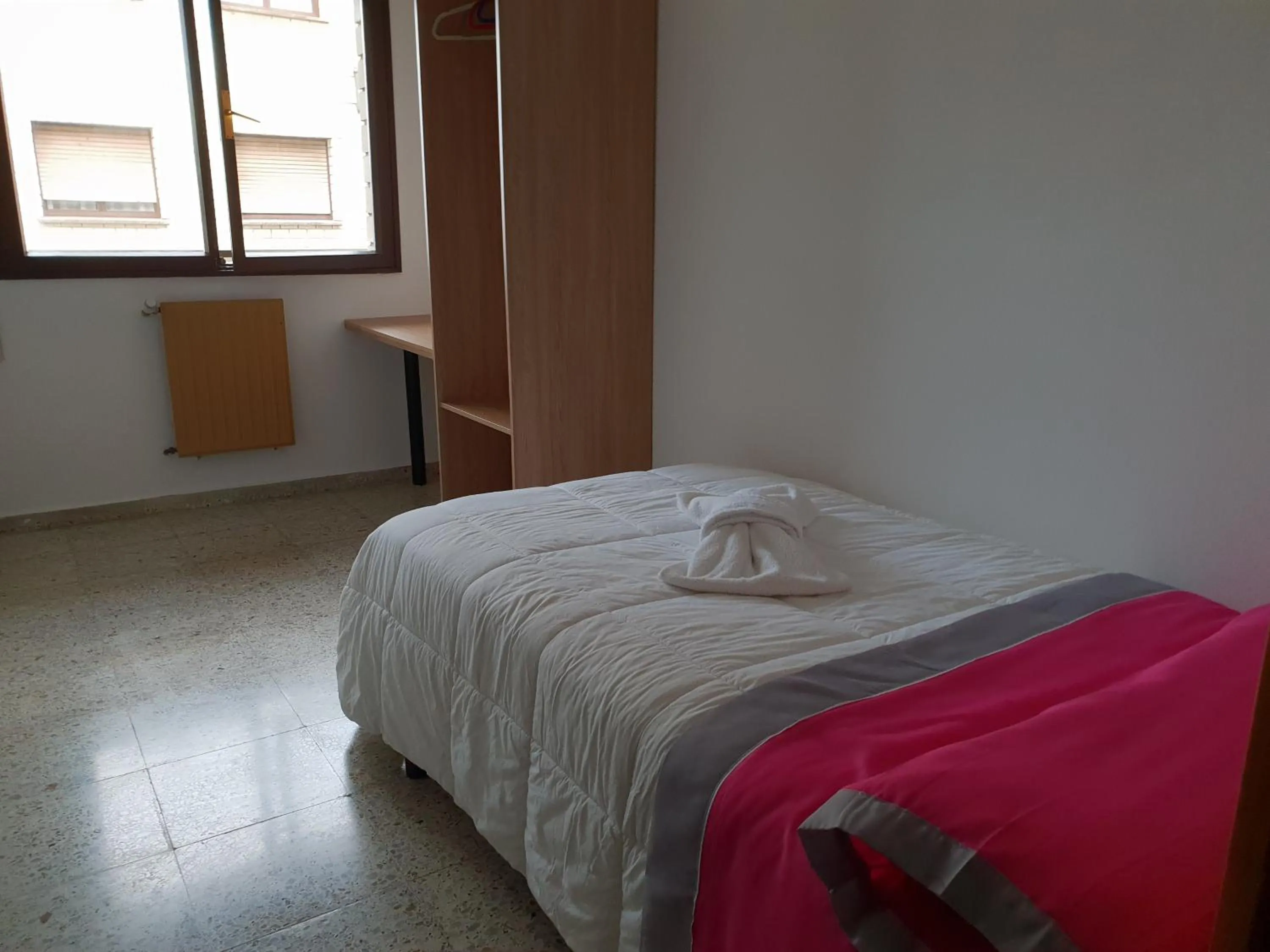 Bed in Apartamentos O Cargadeiro Ribadeo