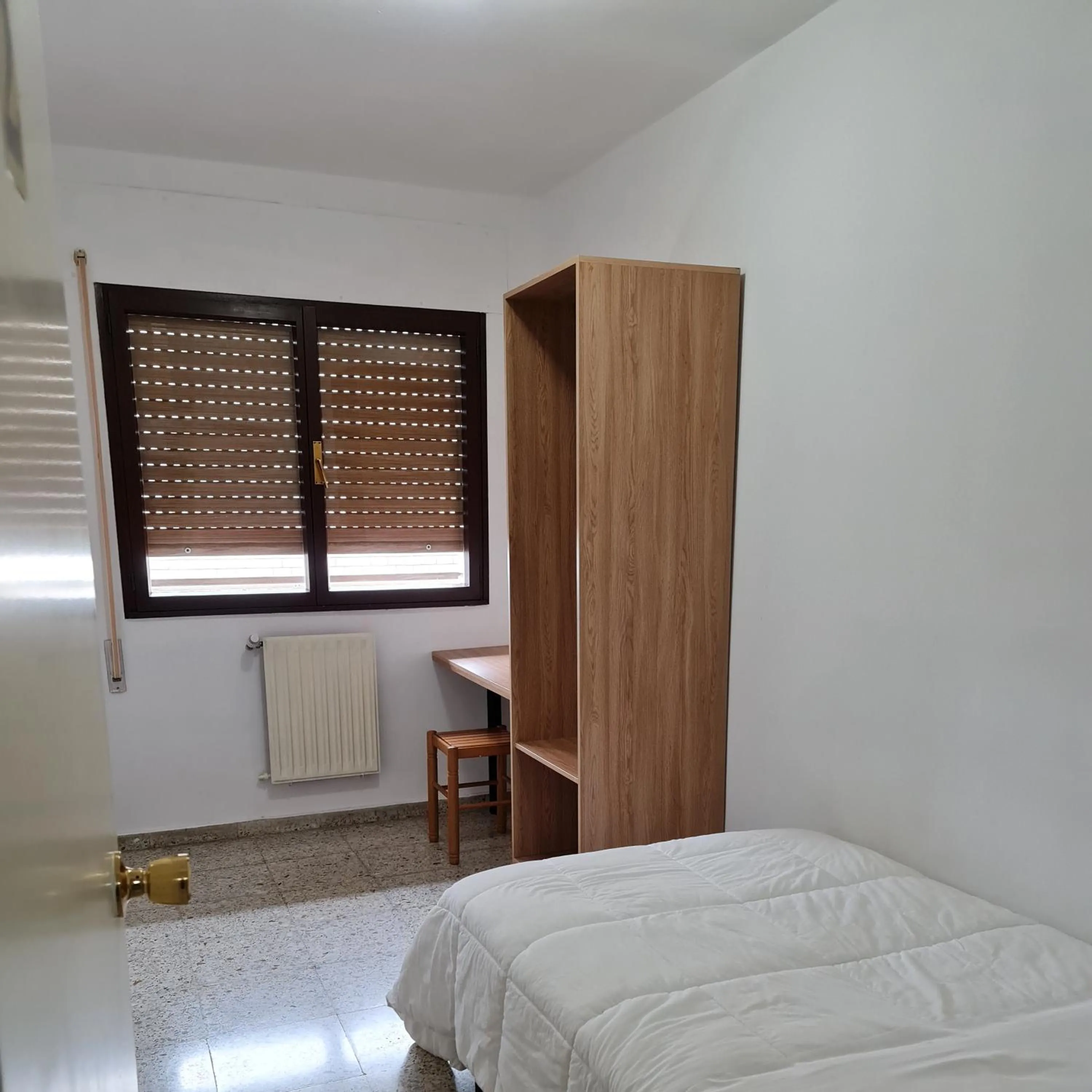 Bed in Apartamentos O Cargadeiro Ribadeo