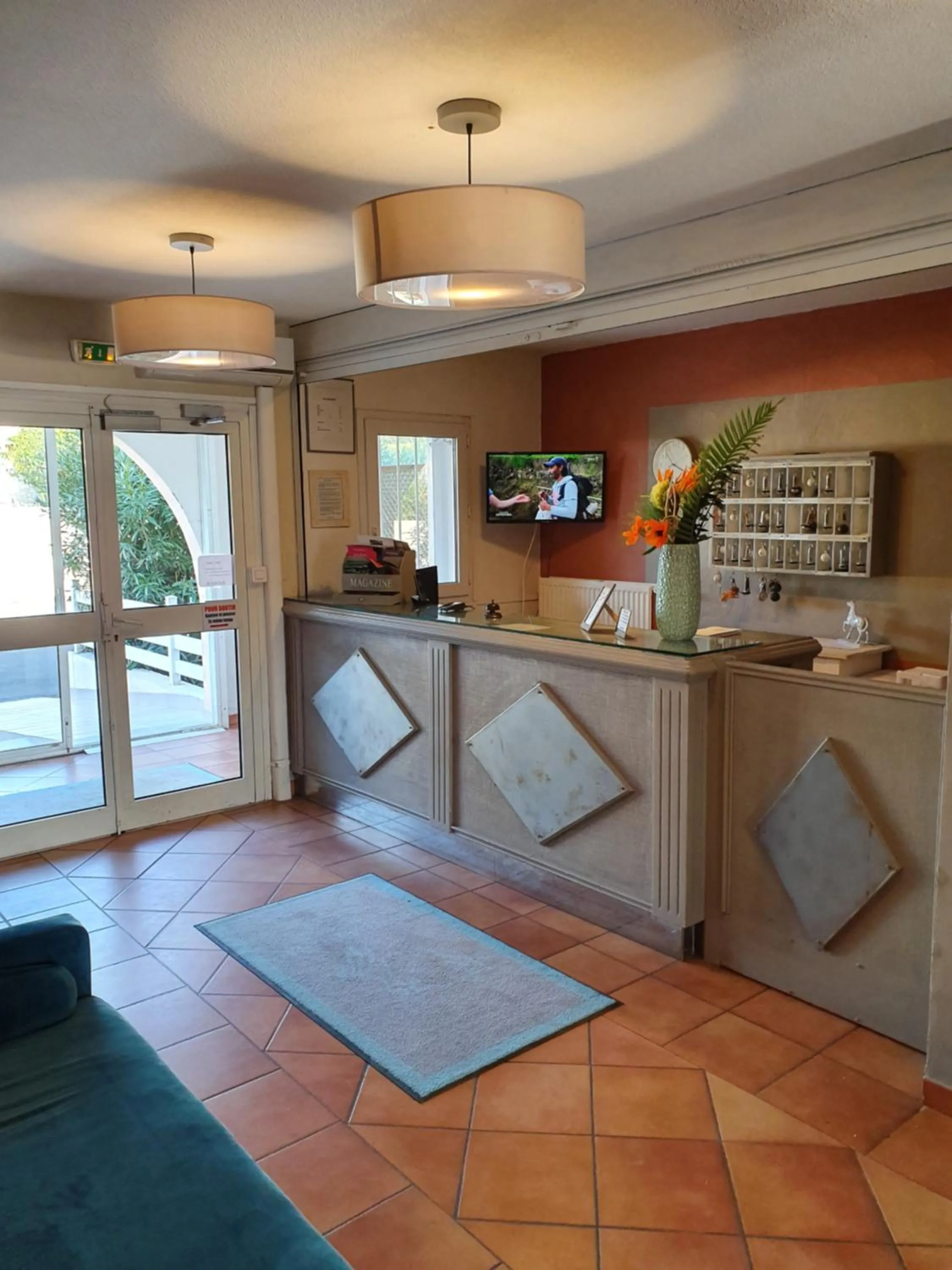 Lobby or reception in Hôtel Athéna