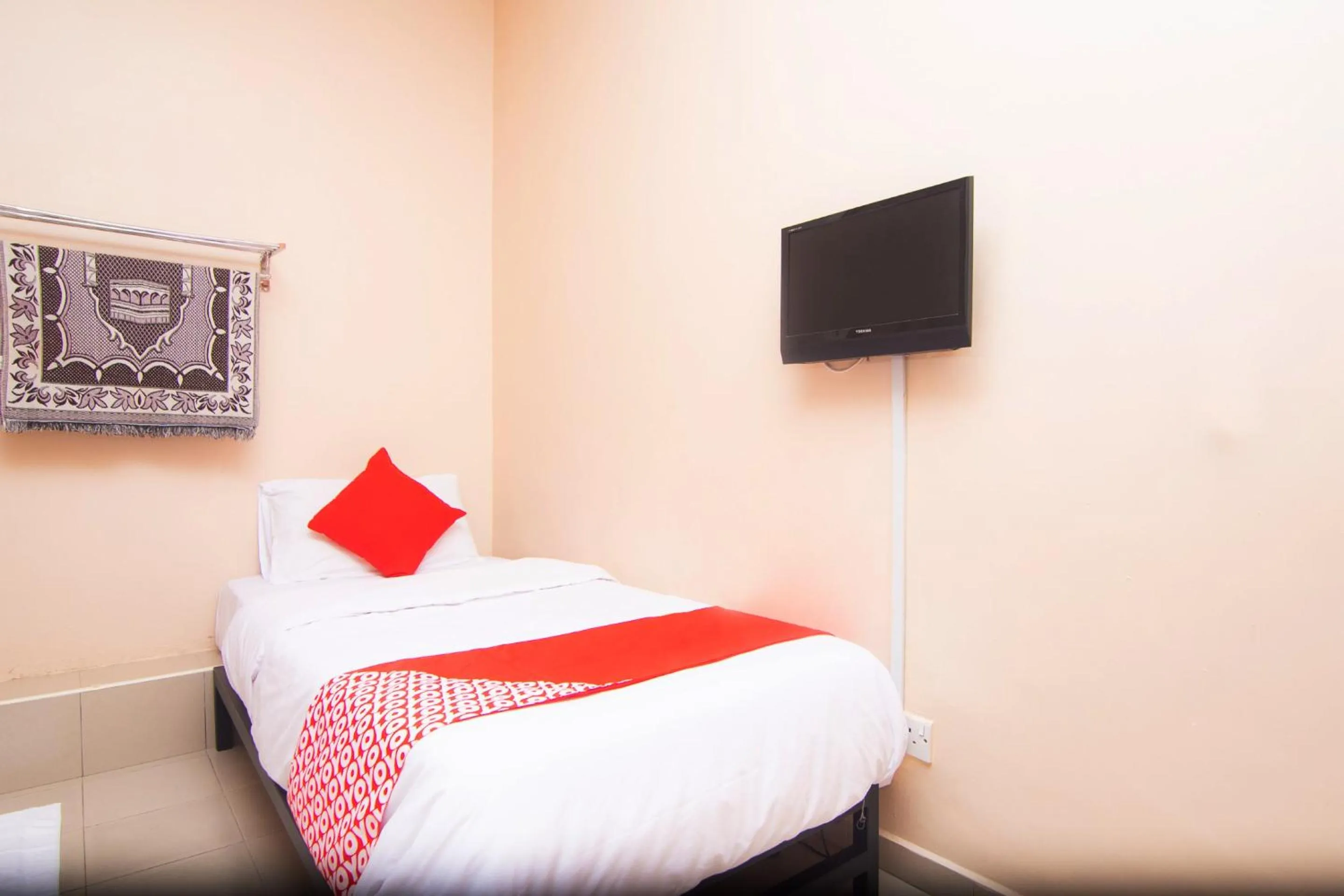 Bed in Hotel O Hajah Rohayah