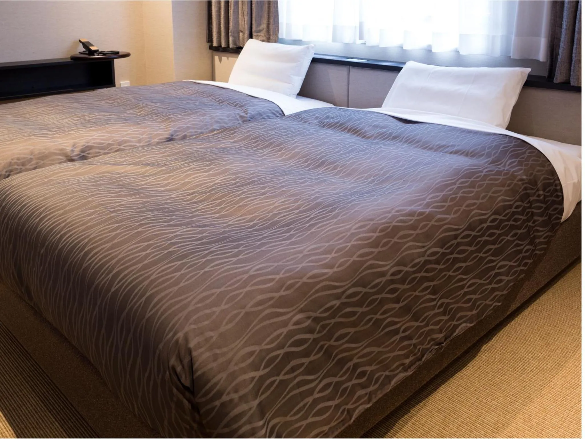 Photo of the whole room, Bed in THE HOTELS HAKATA KASANE Bayside