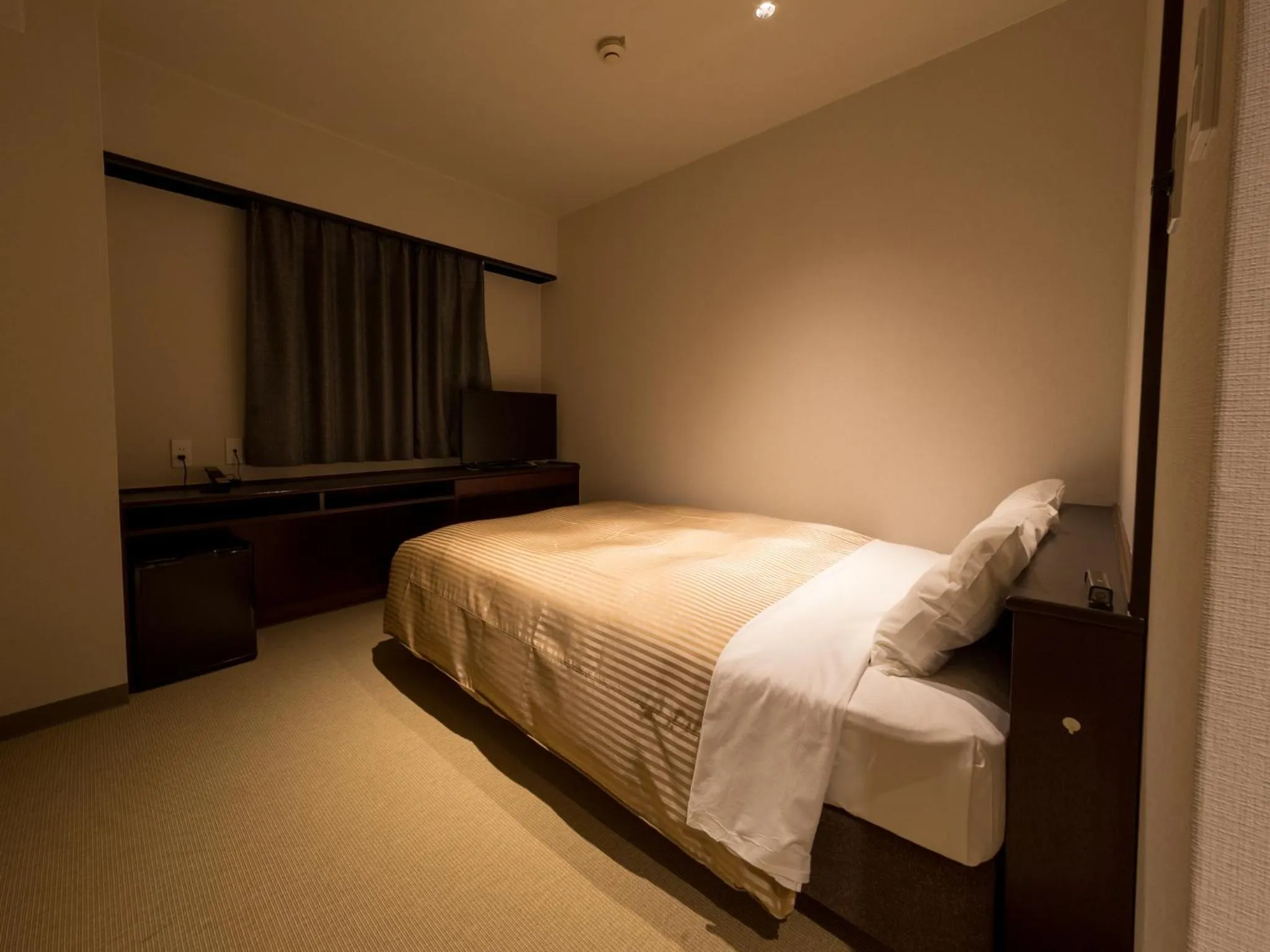 Photo of the whole room, Bed in THE HOTELS HAKATA KASANE Bayside