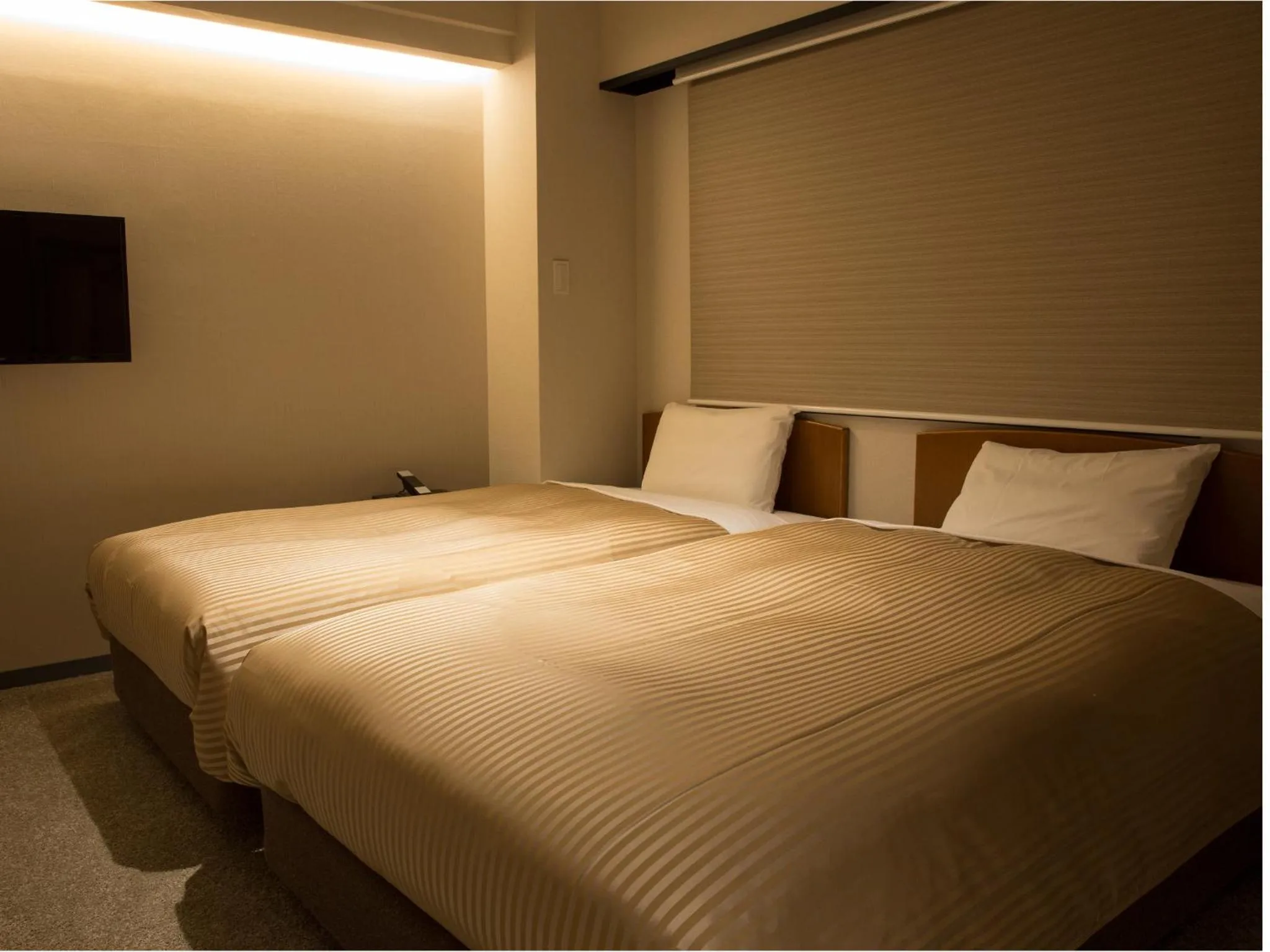 Photo of the whole room, Bed in THE HOTELS HAKATA KASANE Bayside