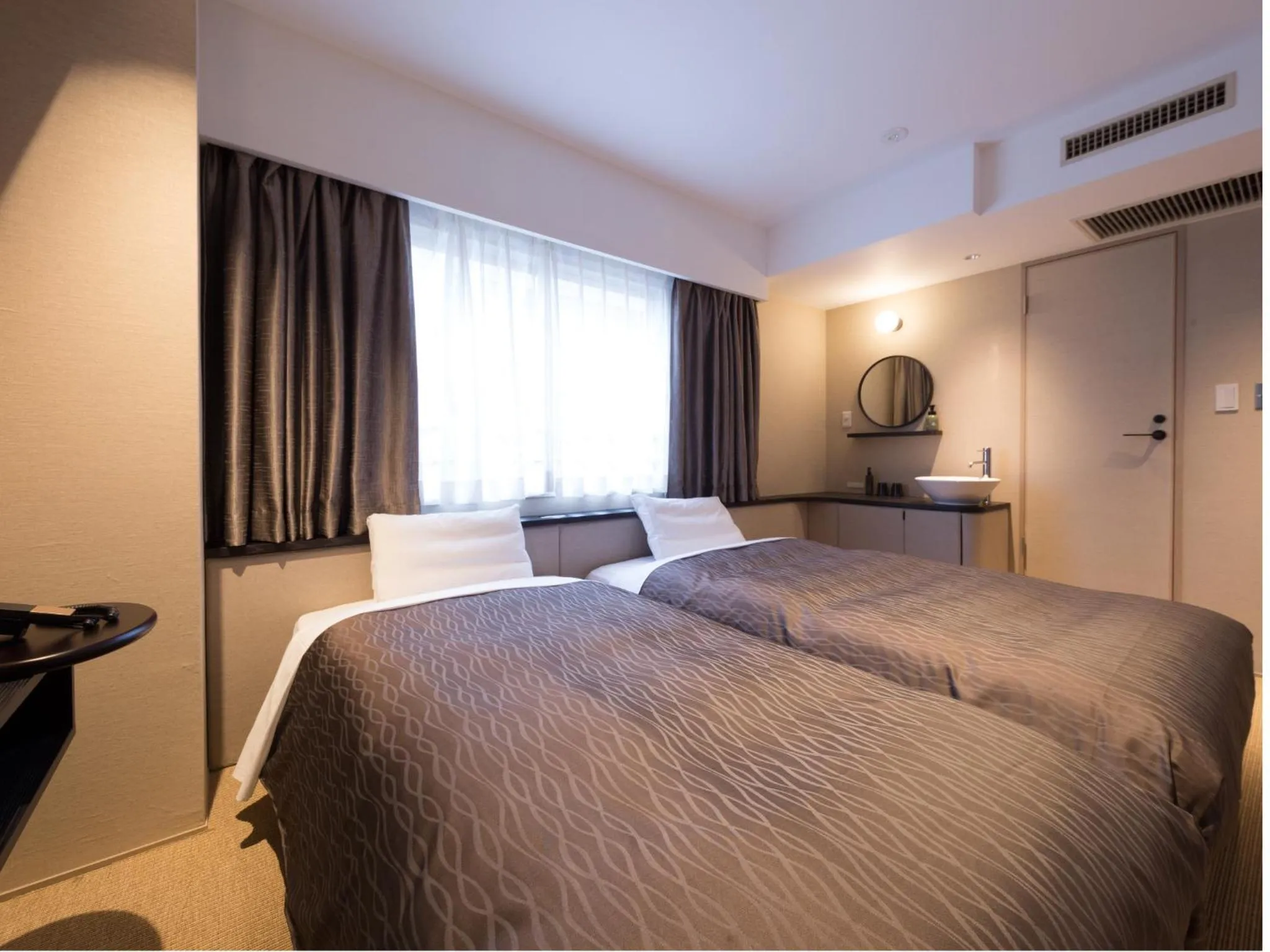 Photo of the whole room, Bed in THE HOTELS HAKATA KASANE Bayside