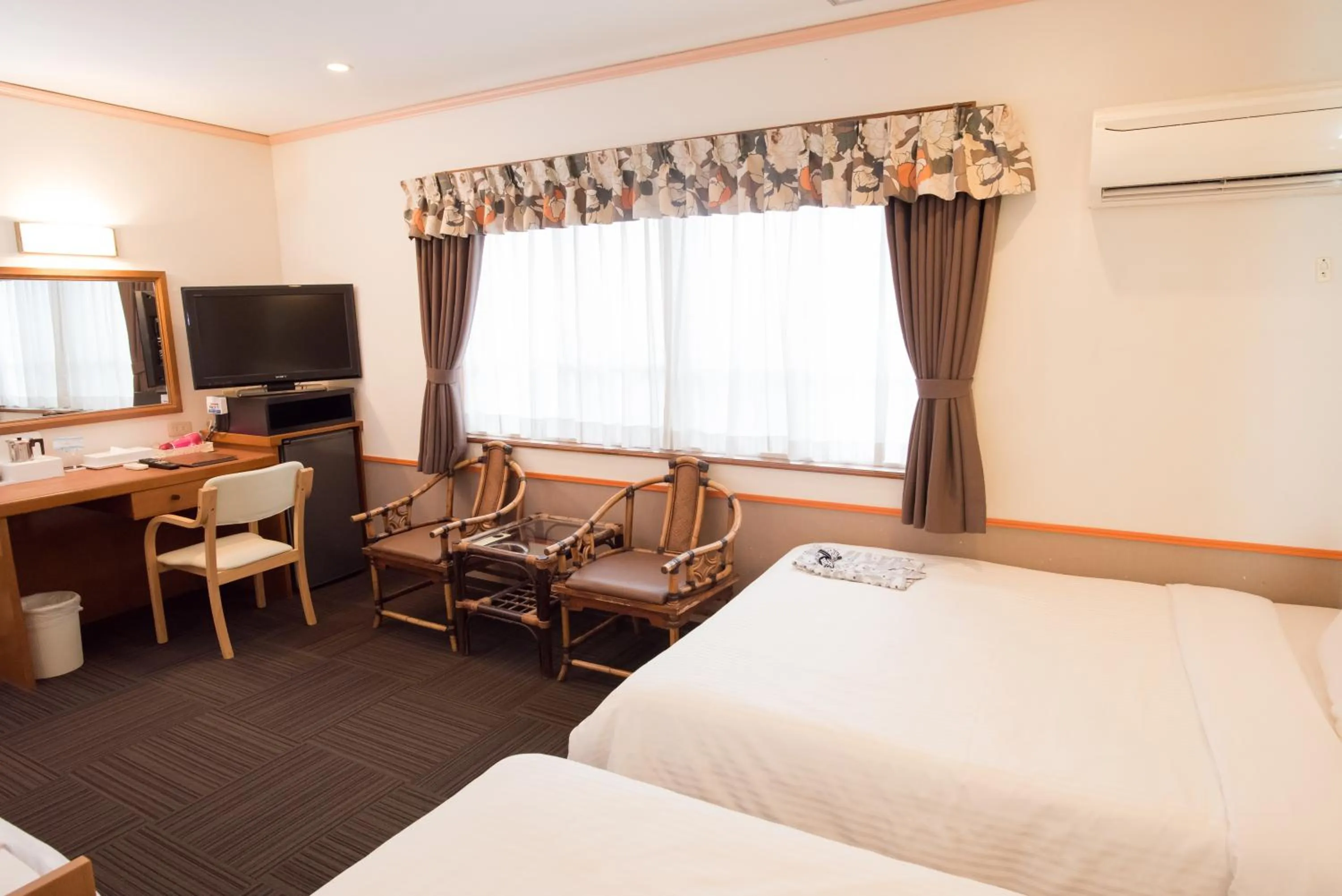 Bed in Crown Hotel Okinawa