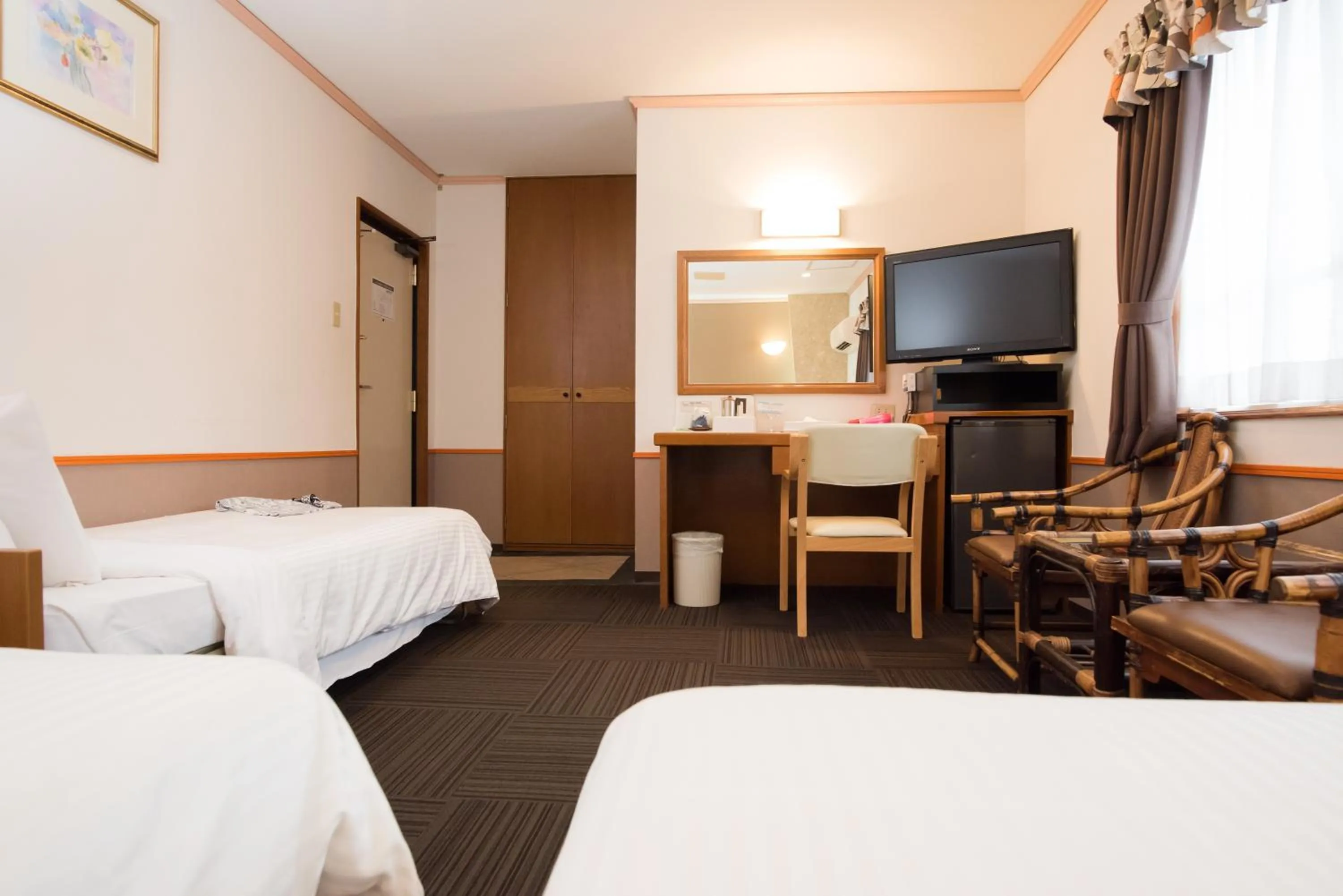 Bed in Crown Hotel Okinawa